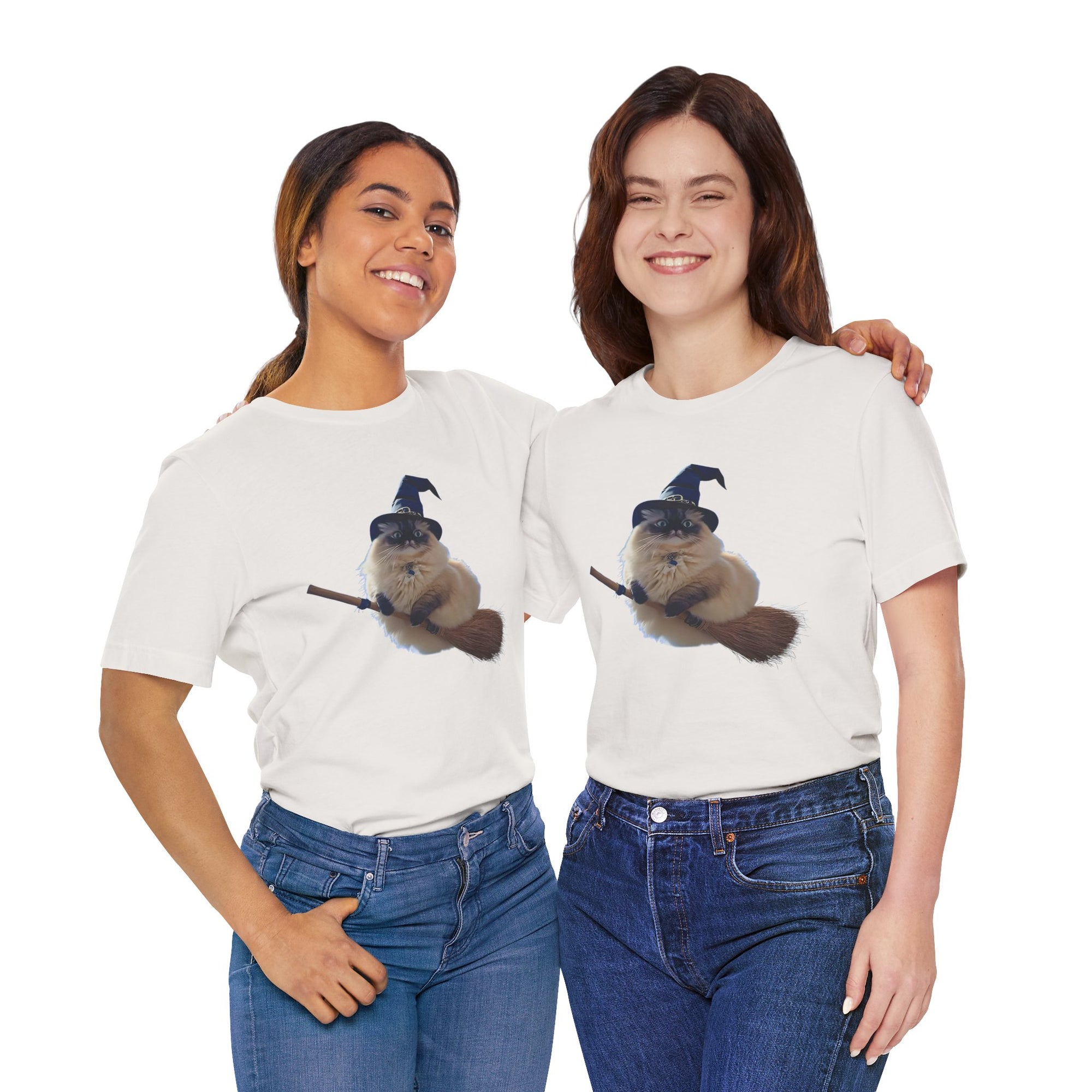 Two people wearing white t-shirts with a graphic of a cat in a witch hat and broom.