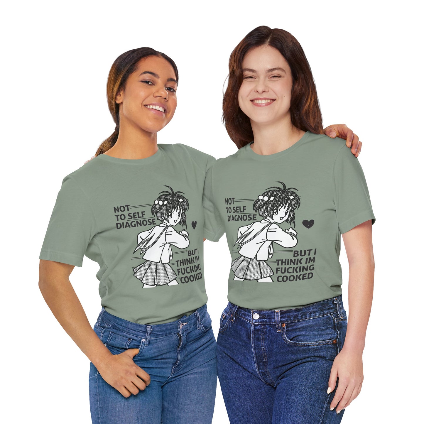 Two women wearing green t-shirts with a graphic and text, standing side by side against a white background.