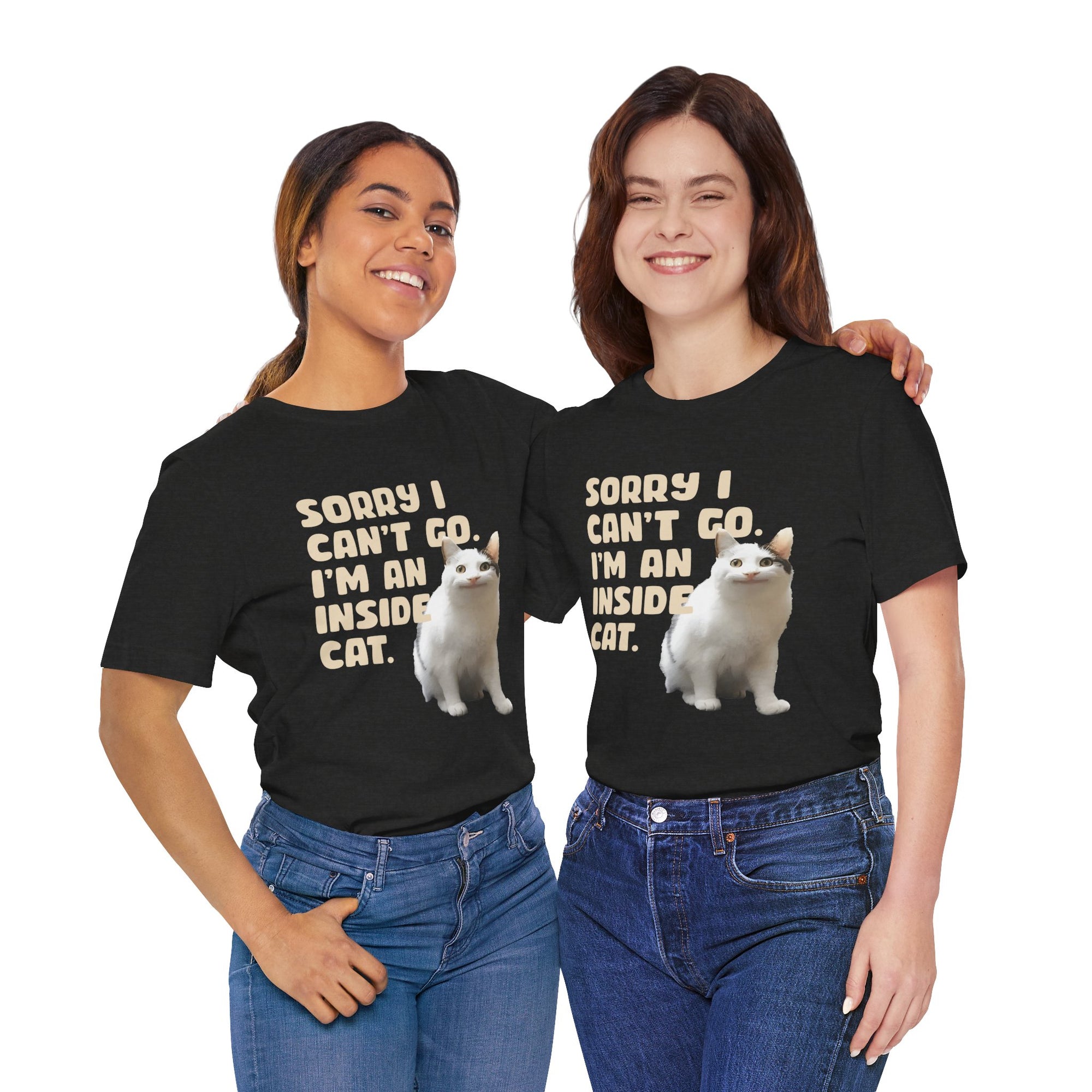 Two people wearing black t-shirts with a graphic of a cat and text, standing side by side against a white background.