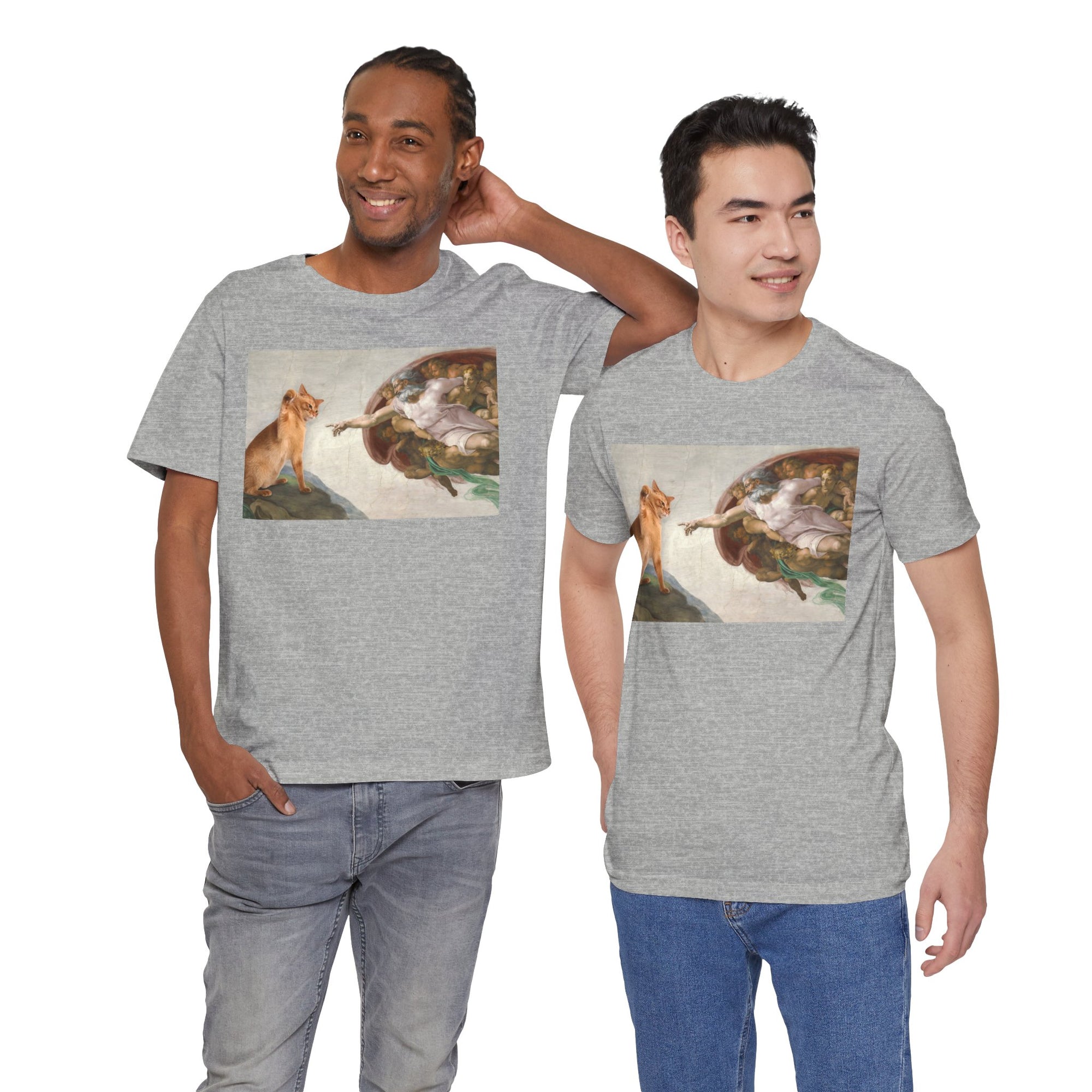 Two men wearing gray t-shirts with a graphic design of a cat and god 