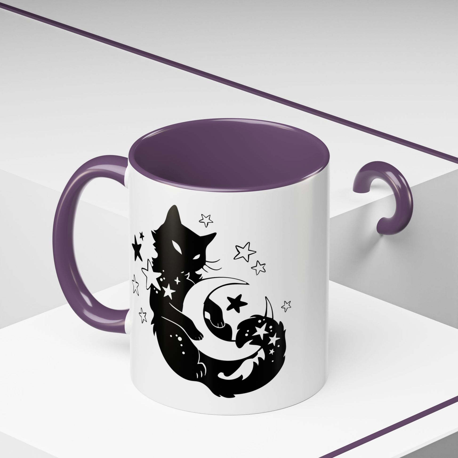 White mug with purple interior and handle featuring a black cat, moon, and star design on a white background.