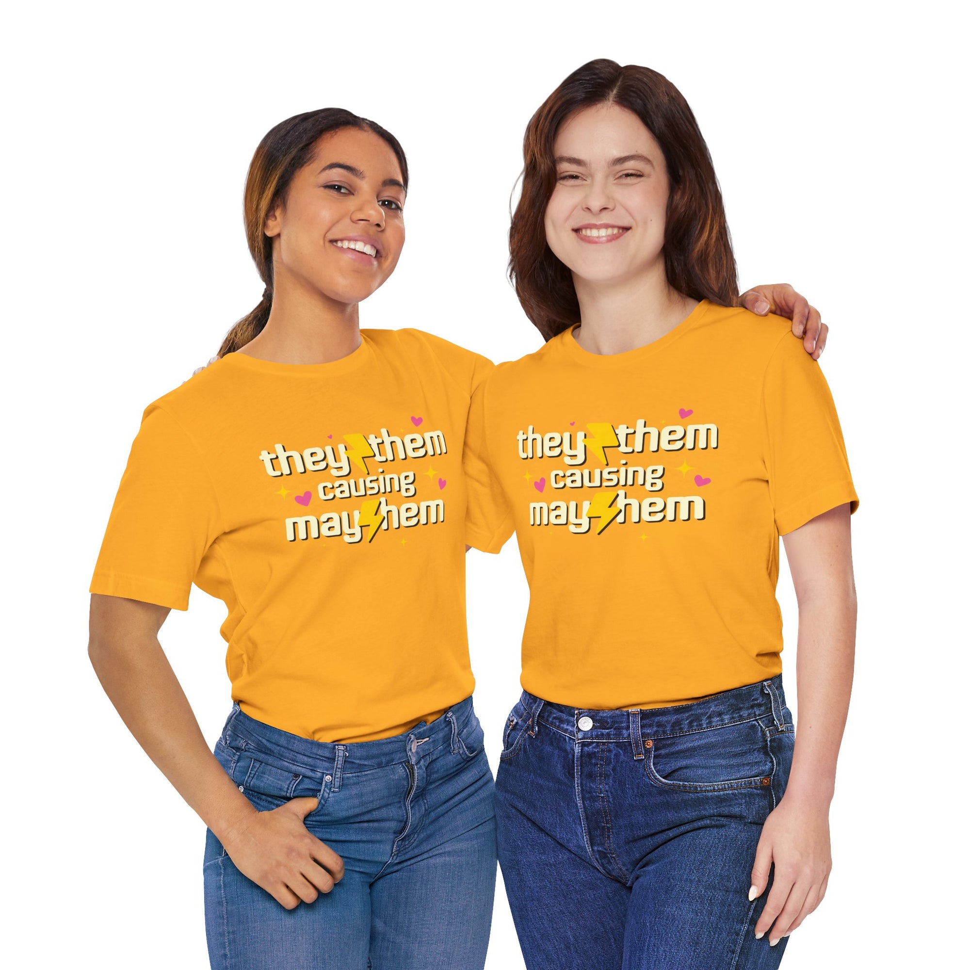 Two people wearing yellow t-shirts with pronoun text, standing side by side on a white background.