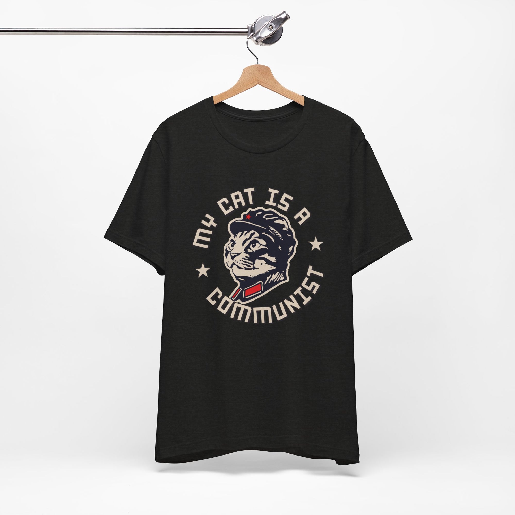 Black t-shirt with a graphic design of a cat and text on a white background