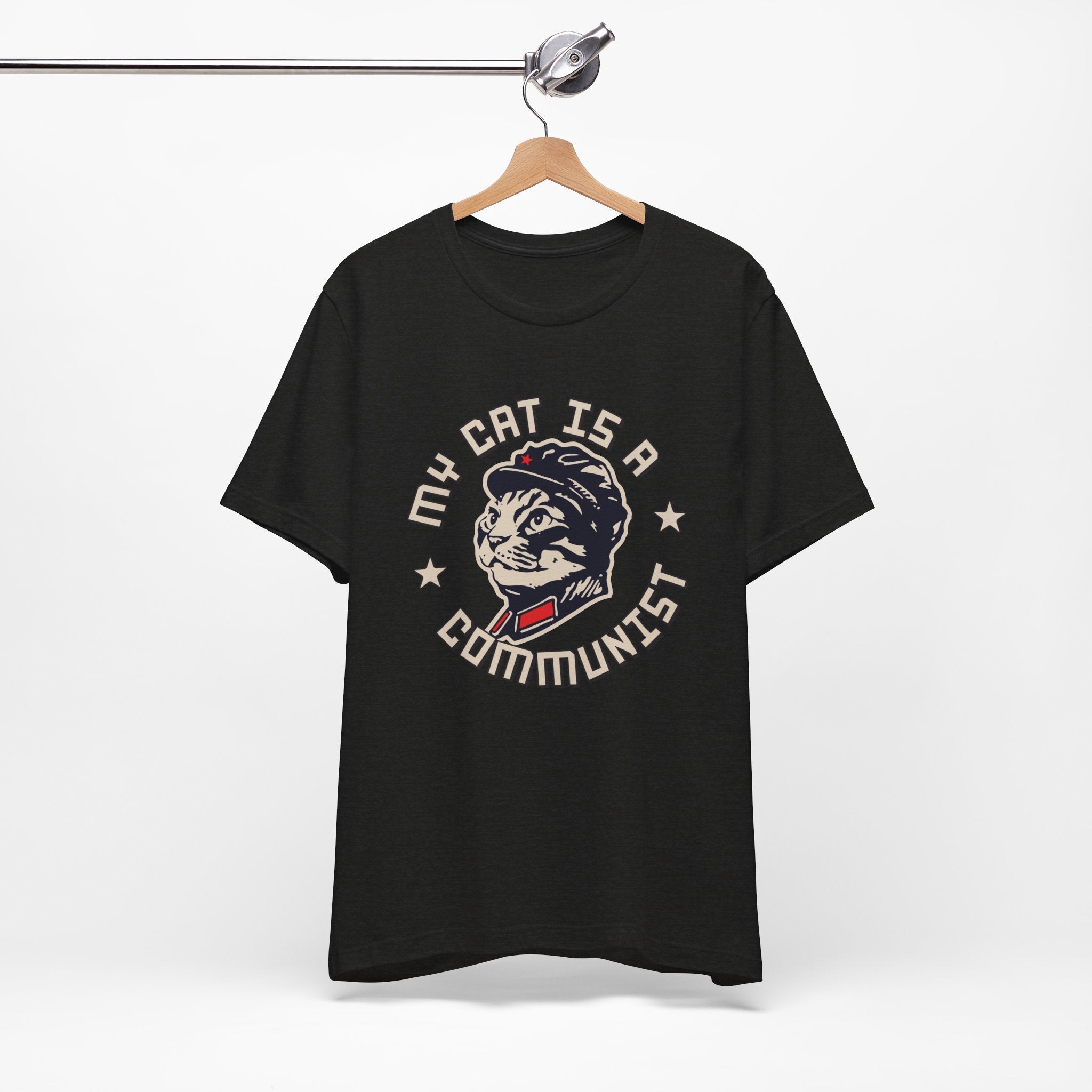 Black t-shirt with a graphic design of a cat and text on a white background