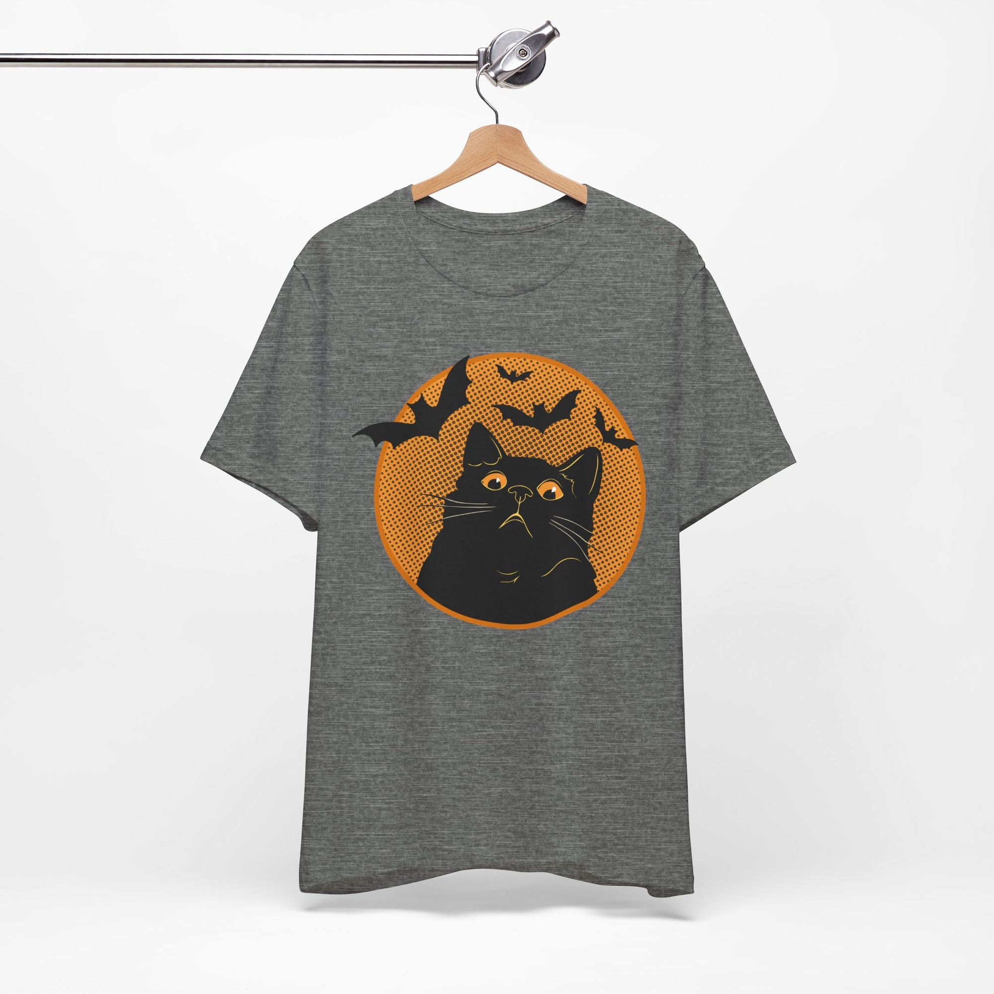 Grey t-shirt featuring a retro-style black cat graphic with orange moon, flying bats, and Halloween-inspired details.