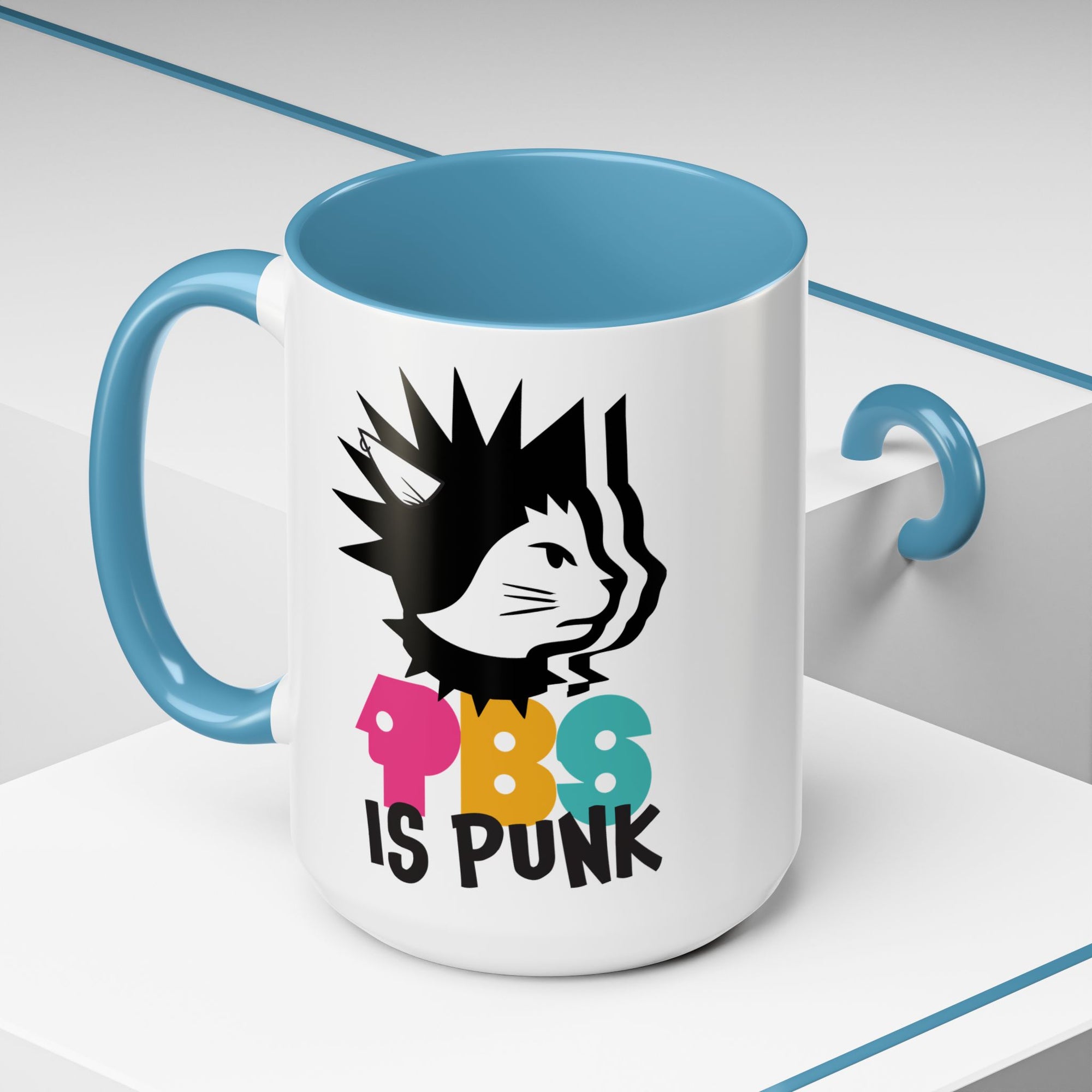 Mug with a cat graphic and 'PBS is Punk' text on a white background