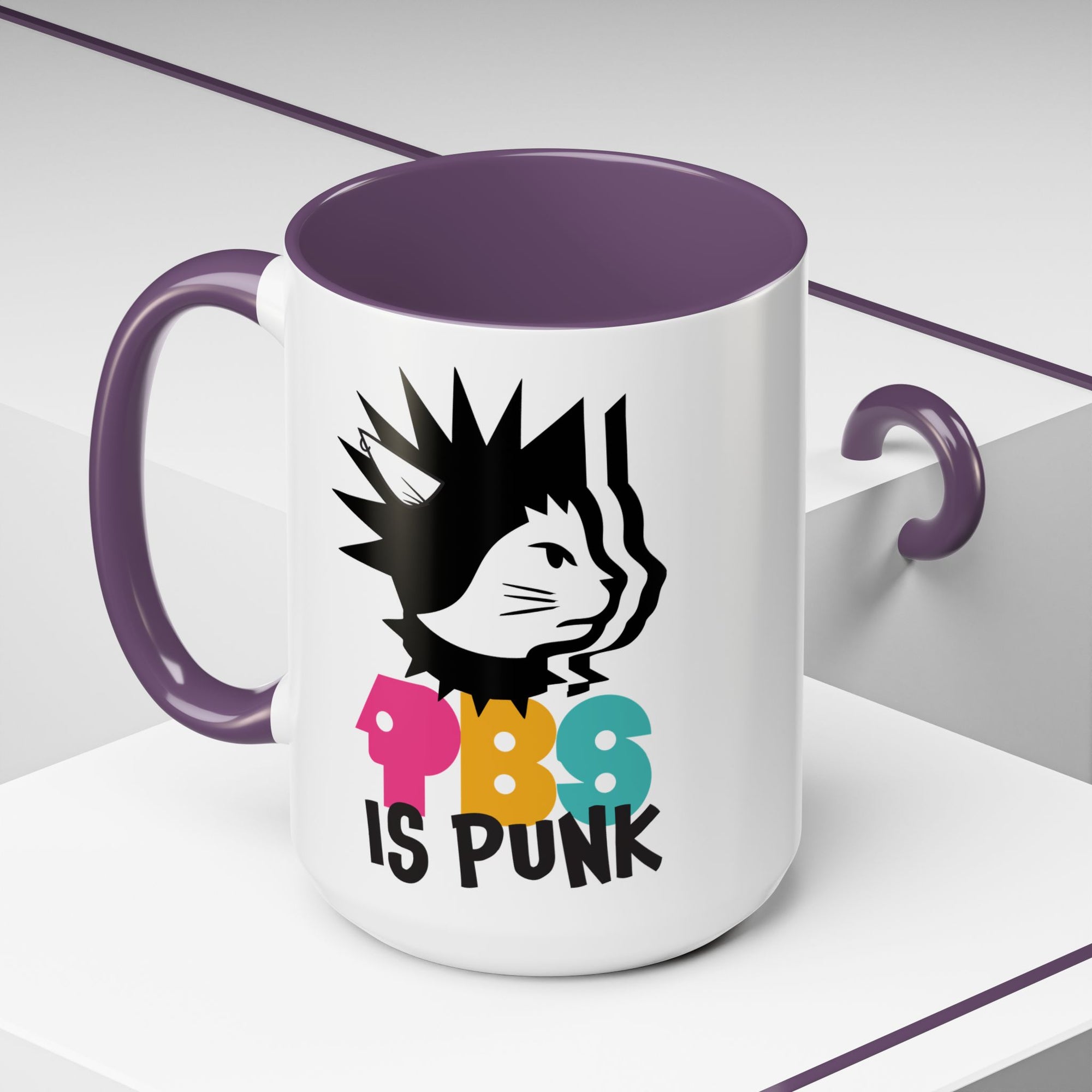 Mug with a graphic design of a cat and text 'PBS IS PUNK' on a white background