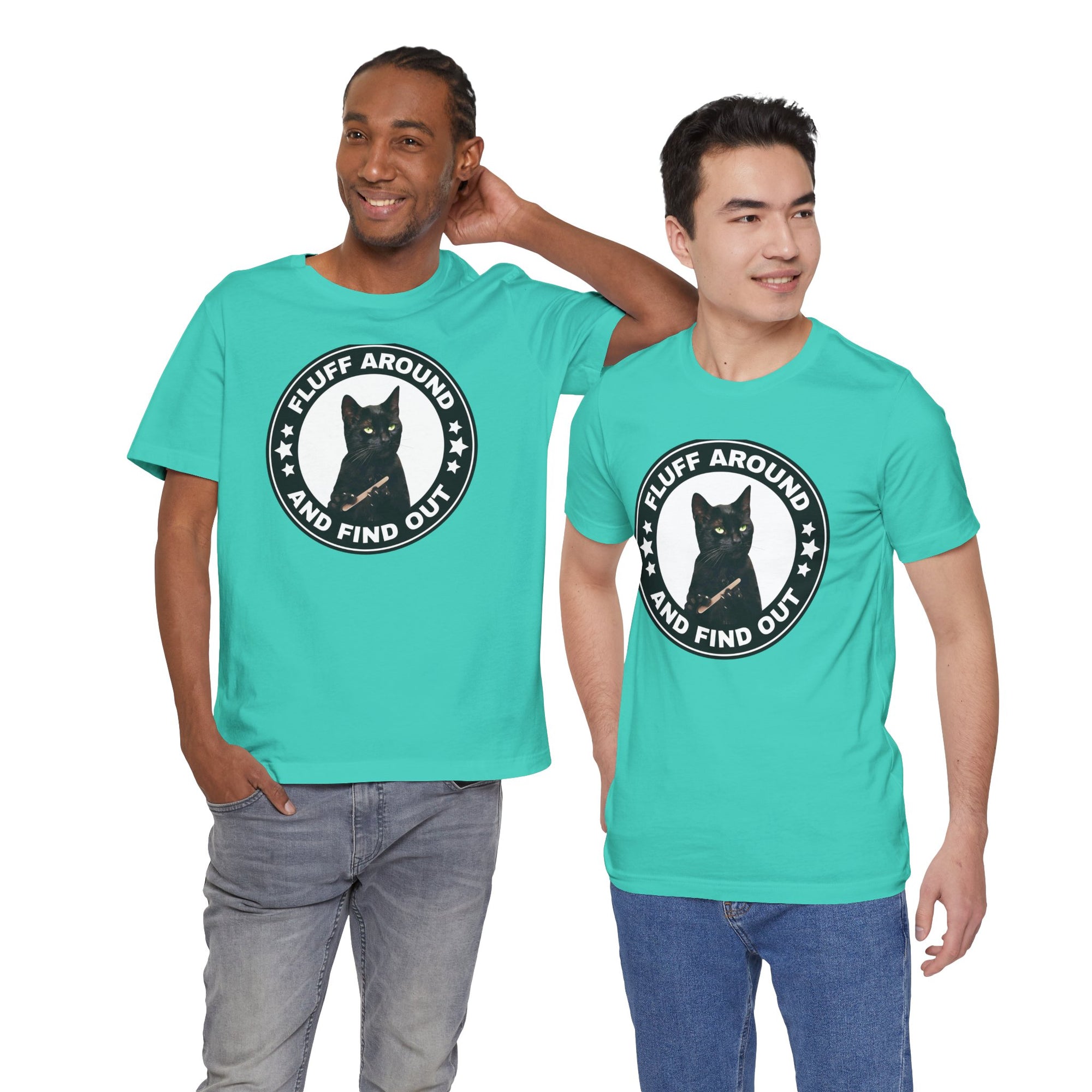Two men wearing turquoise t-shirt featuring a circular badge design with a black cat and the phrase “Fluff Around and Find Out.”