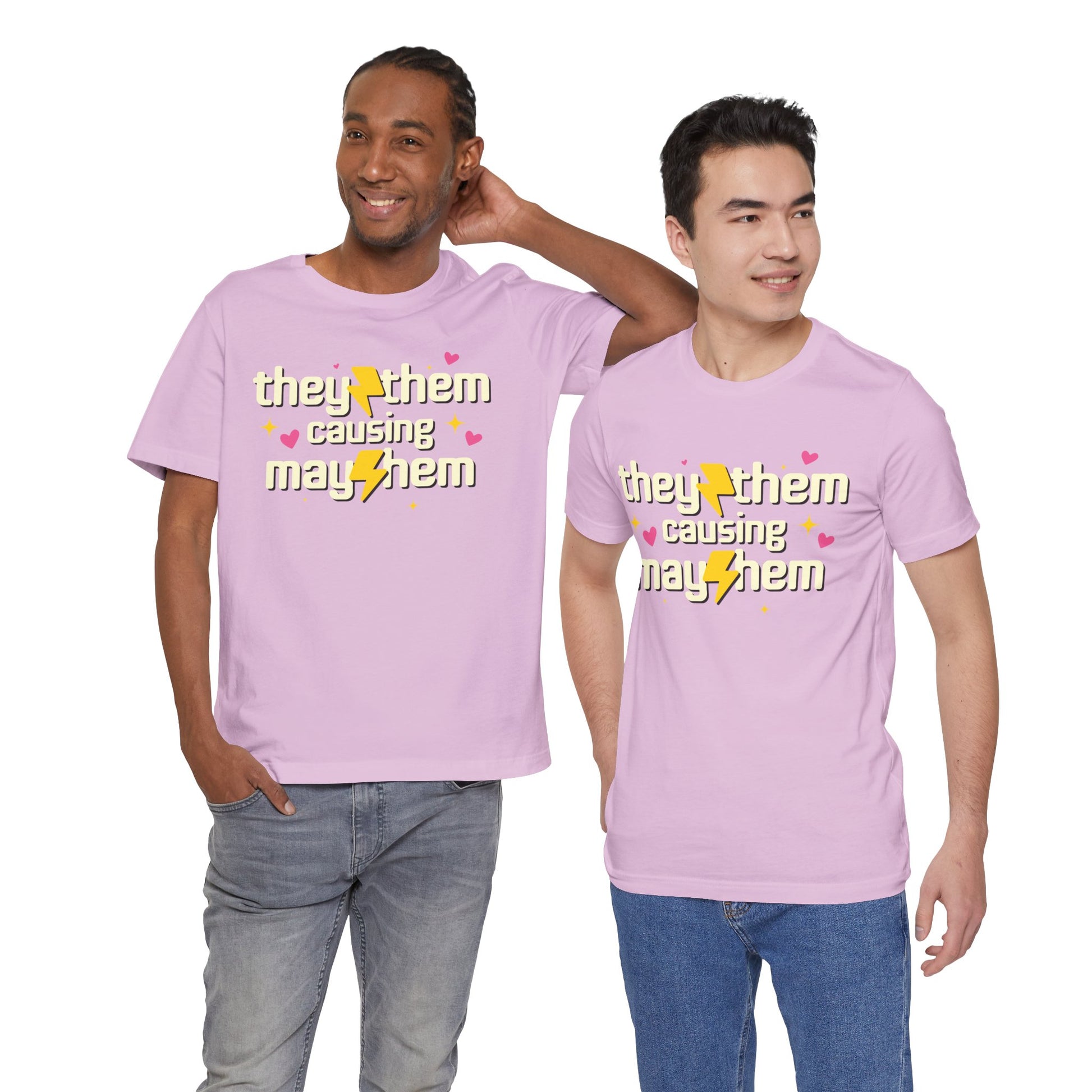 Two people wearing pink t-shirts with a message on a white background