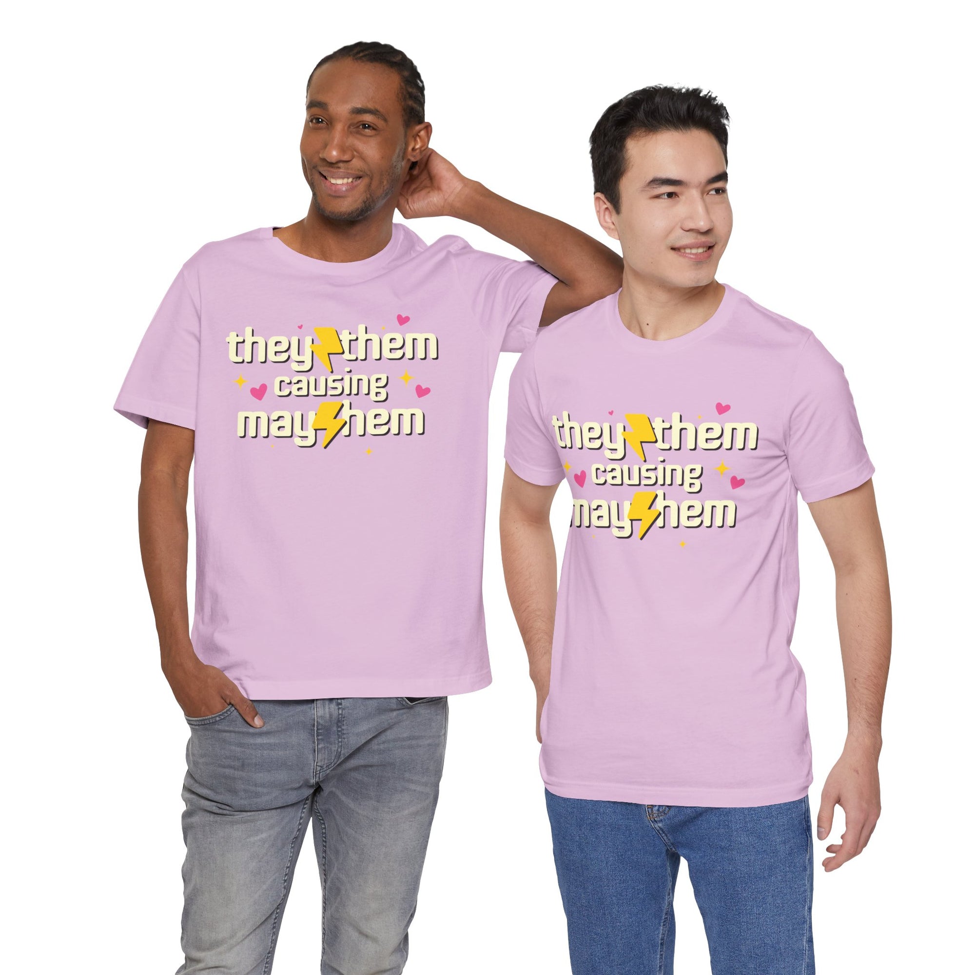 Two people wearing pink t-shirts with a message on a white background
