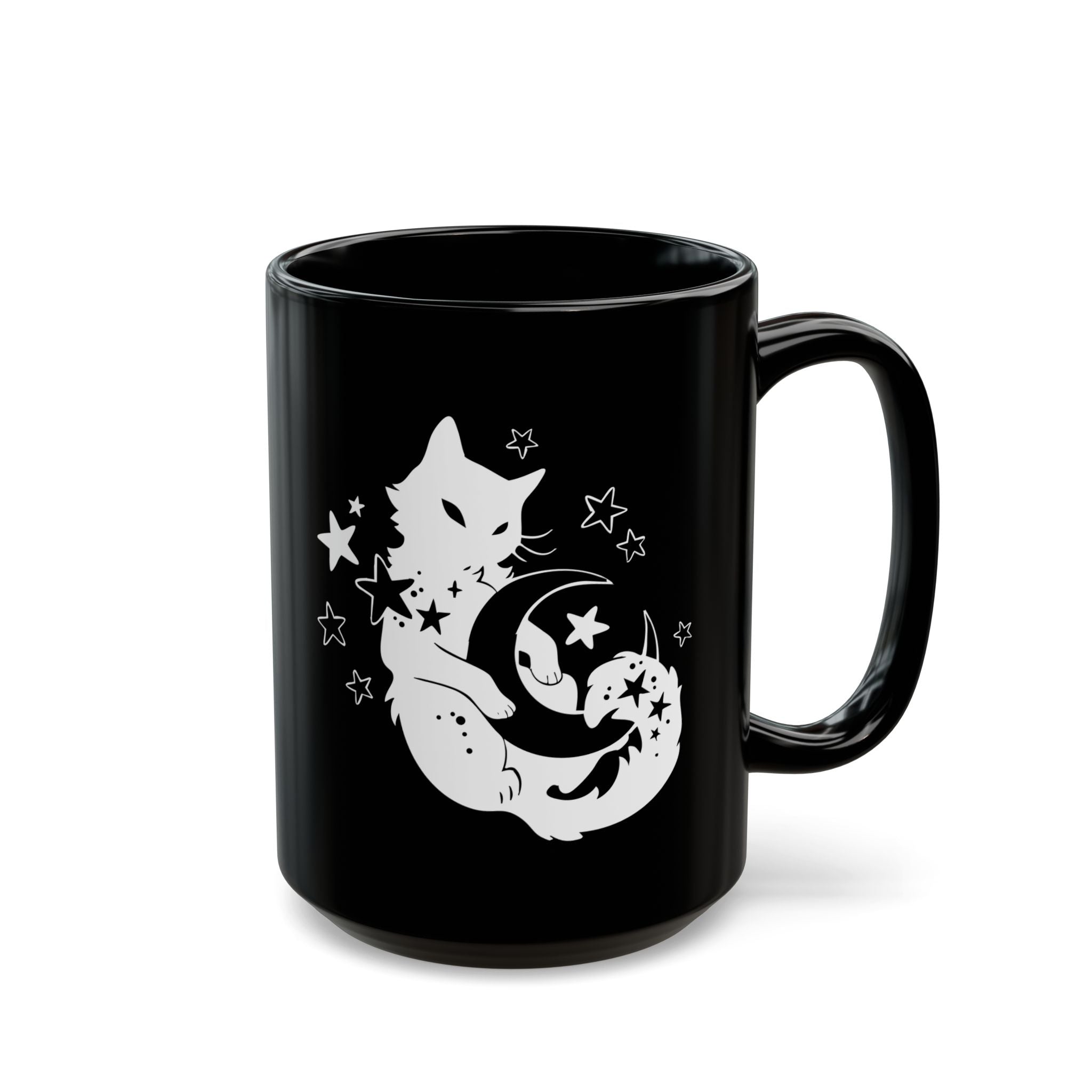 Black mug with a white cat and moon design on a white background