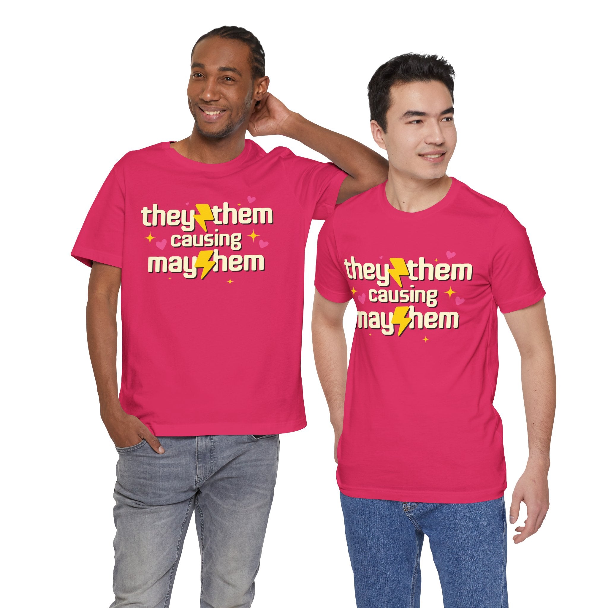 Two people wearing pink t-shirts with a message on a white background