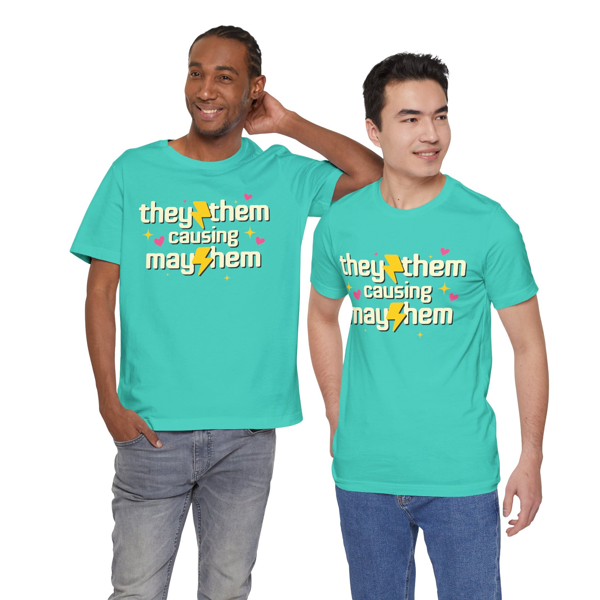 Two people wearing turquoise t-shirts with a colorful text design on a white background