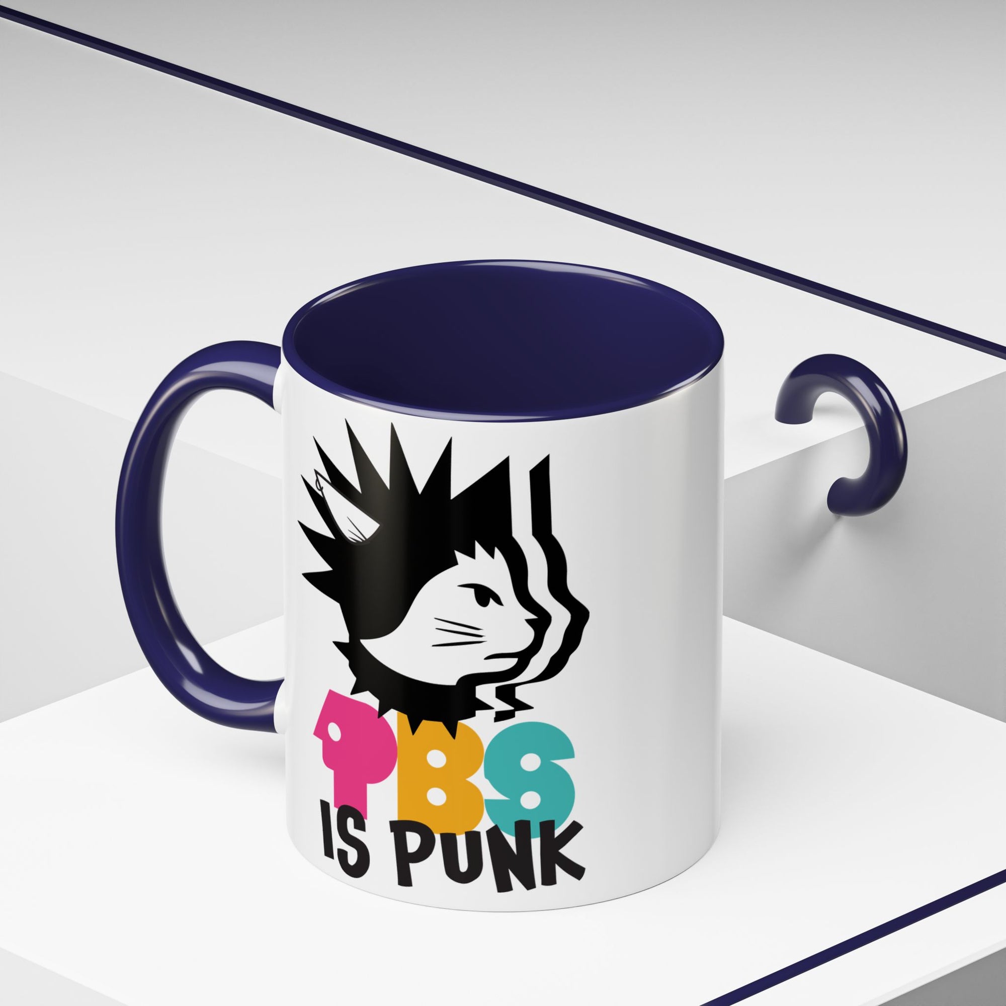 Mug with a graphic design of a cat and text 'PBS IS PUNK' on a white background