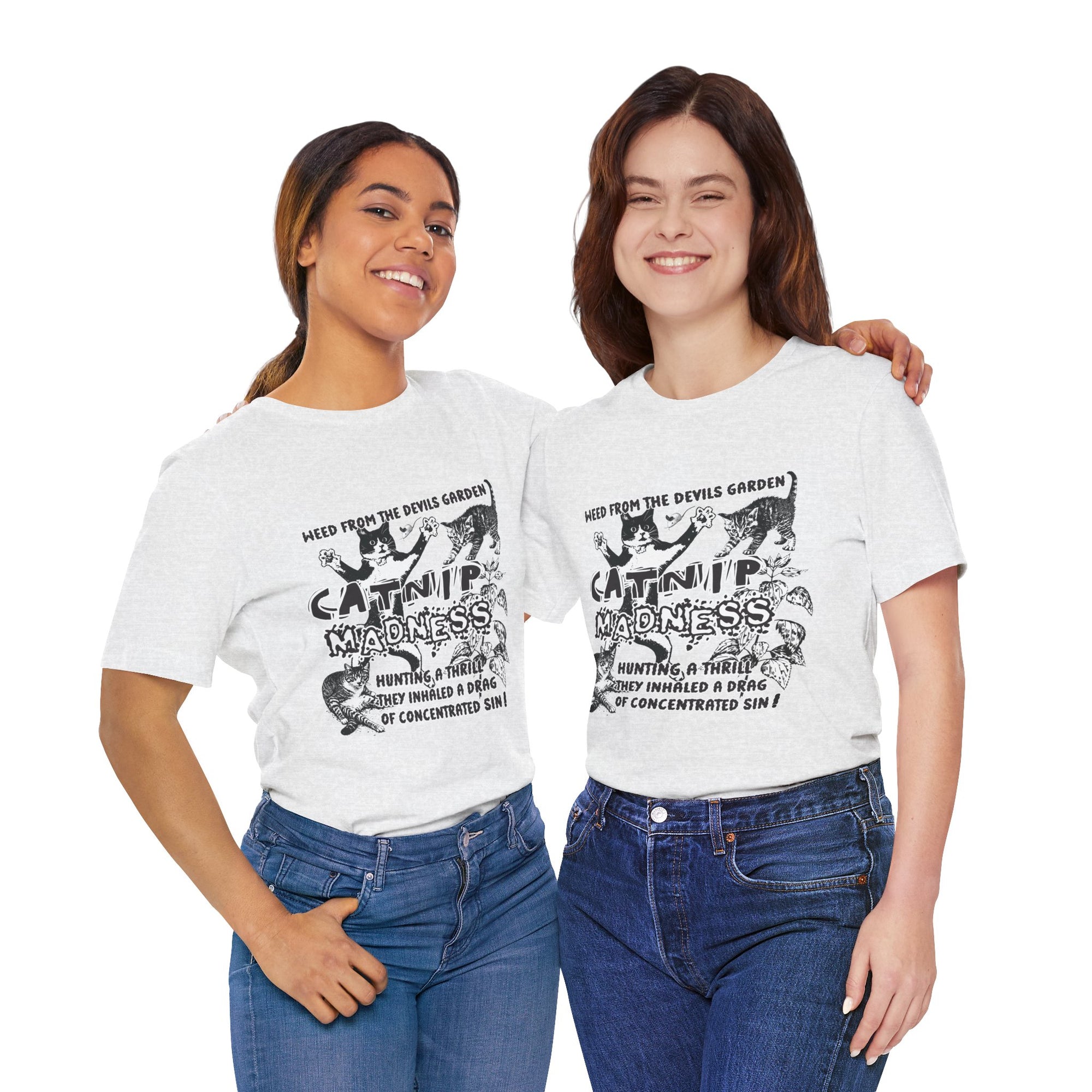 Two women wearing white t-shirts with black graphics on a white background