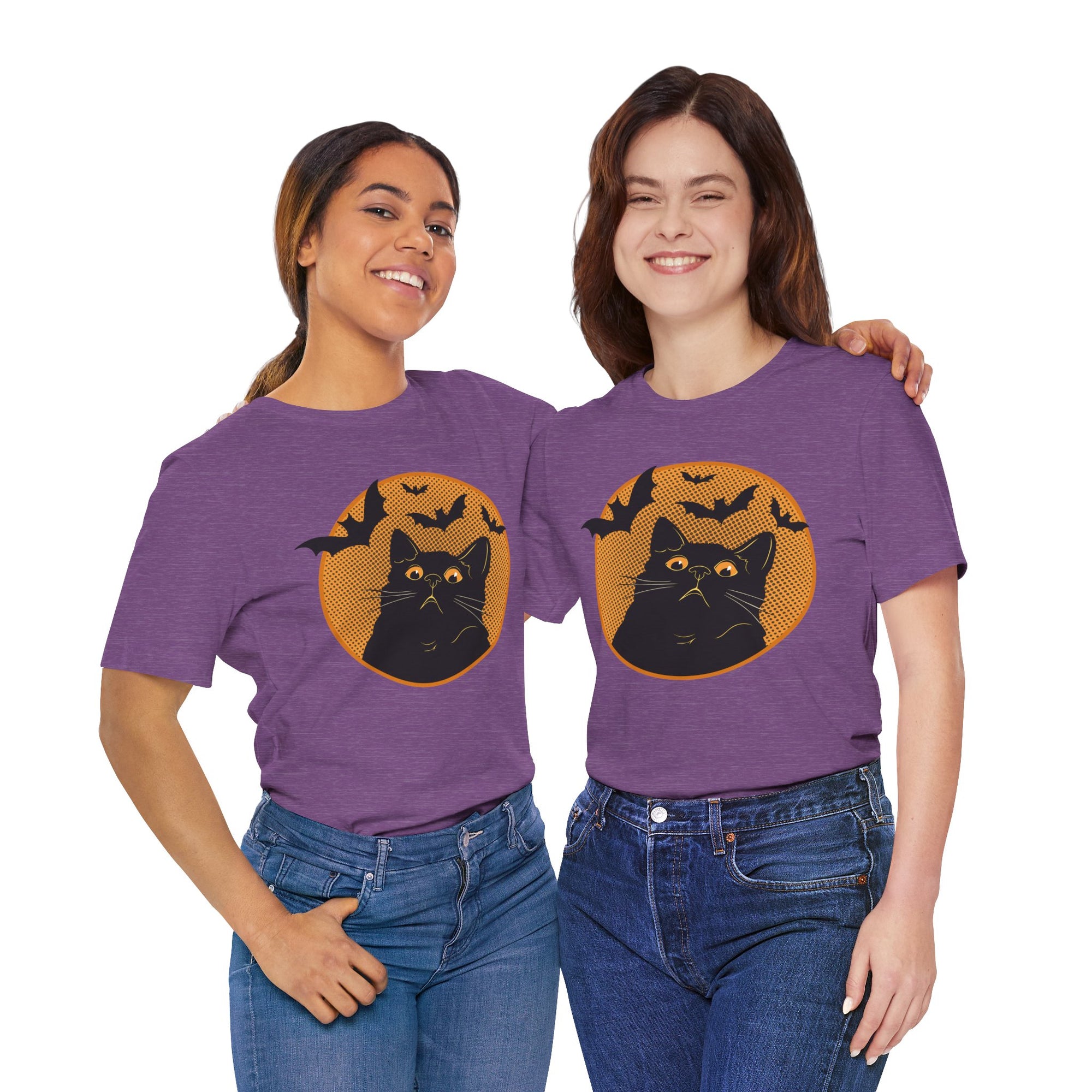 Two people wearing purple t-shirts with a black cat and bats design on a white background
