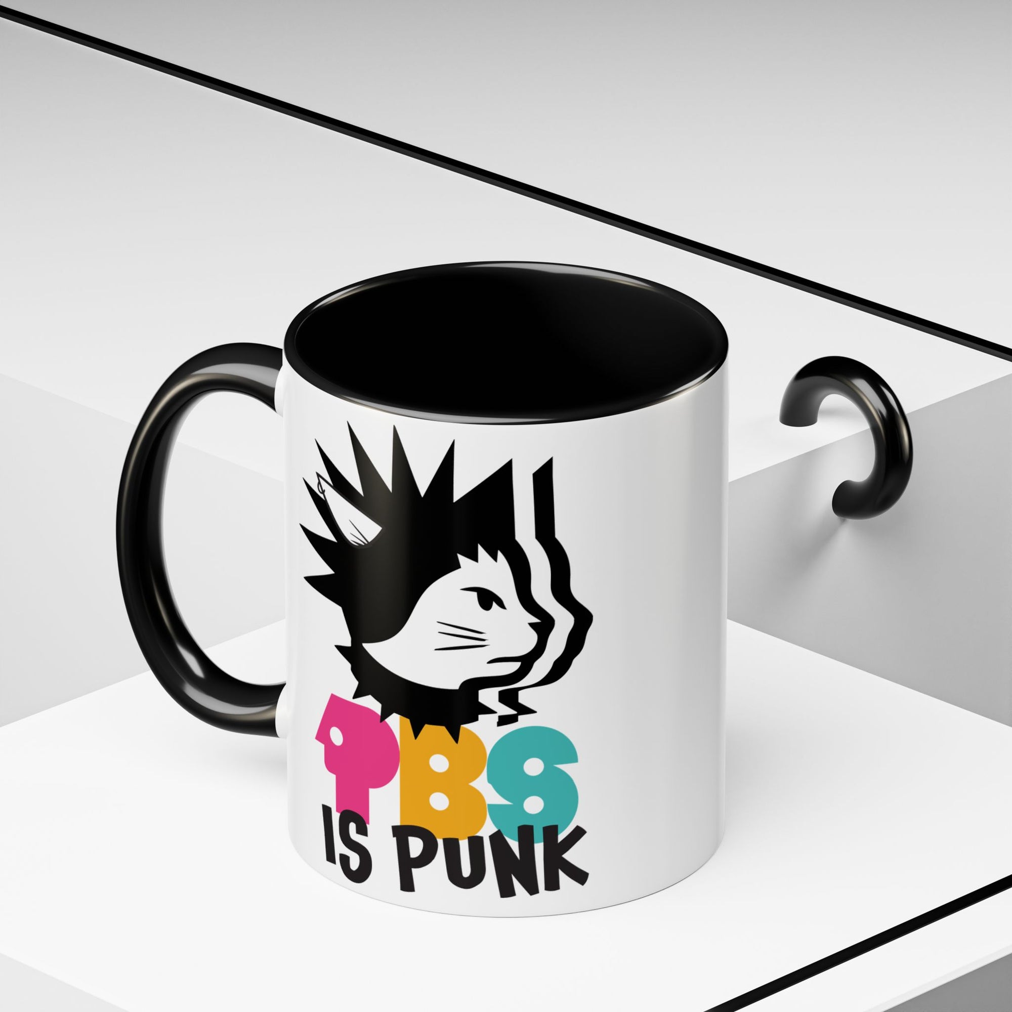 Mug with a cat graphic and 'PBS is Punk' text on a white background