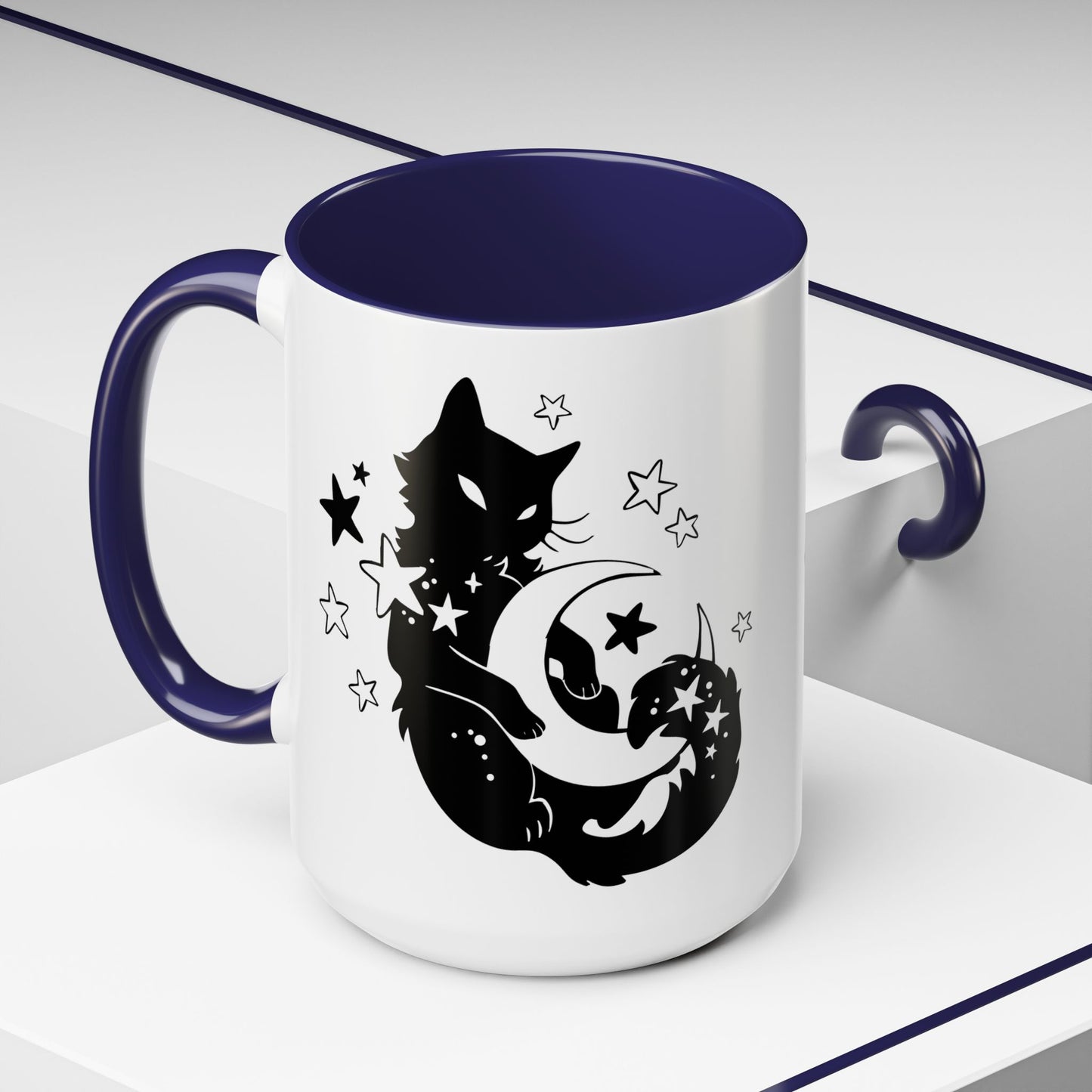 White mug with black cat and moon design on a white background