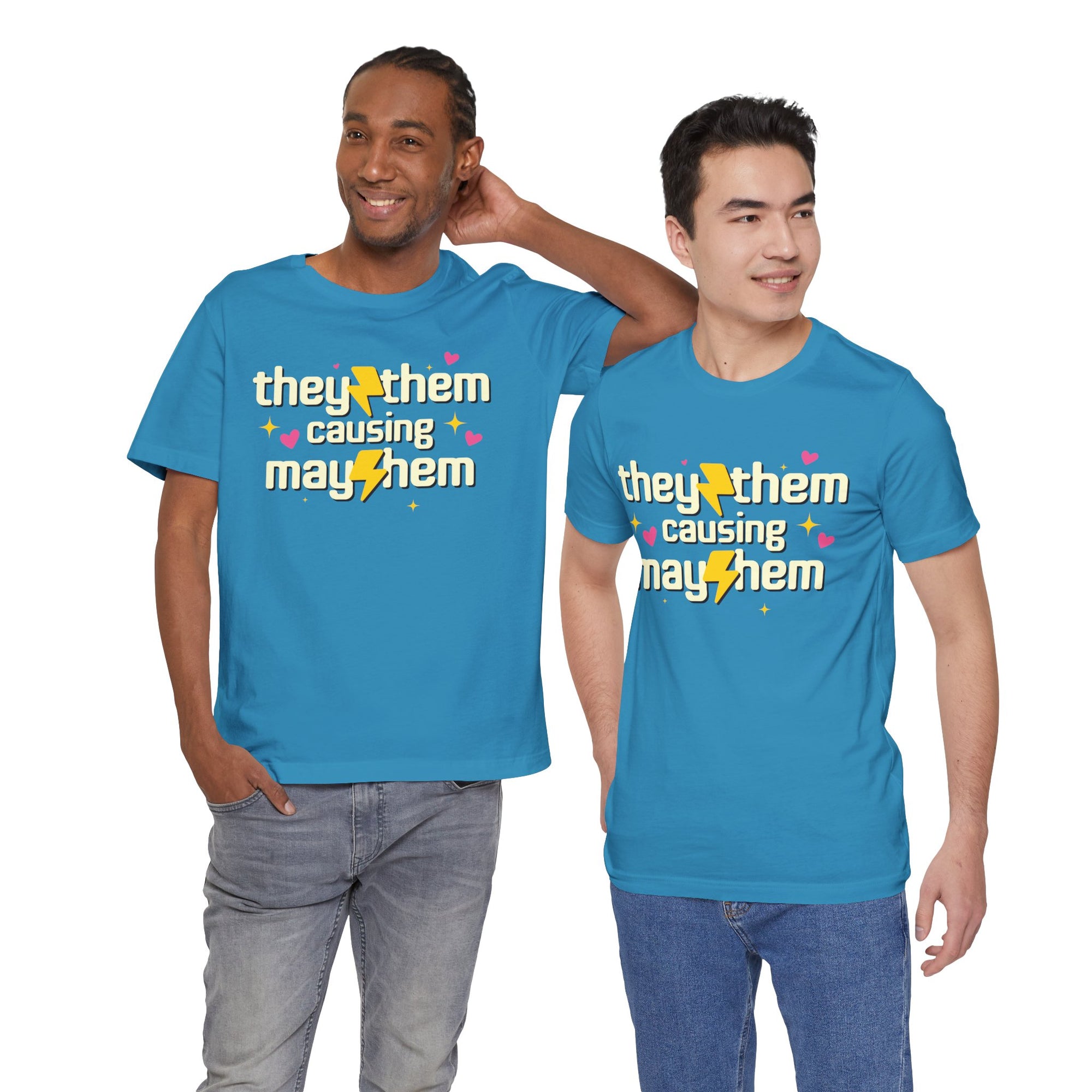 Two people wearing blue t-shirts with a colorful text design on a white background