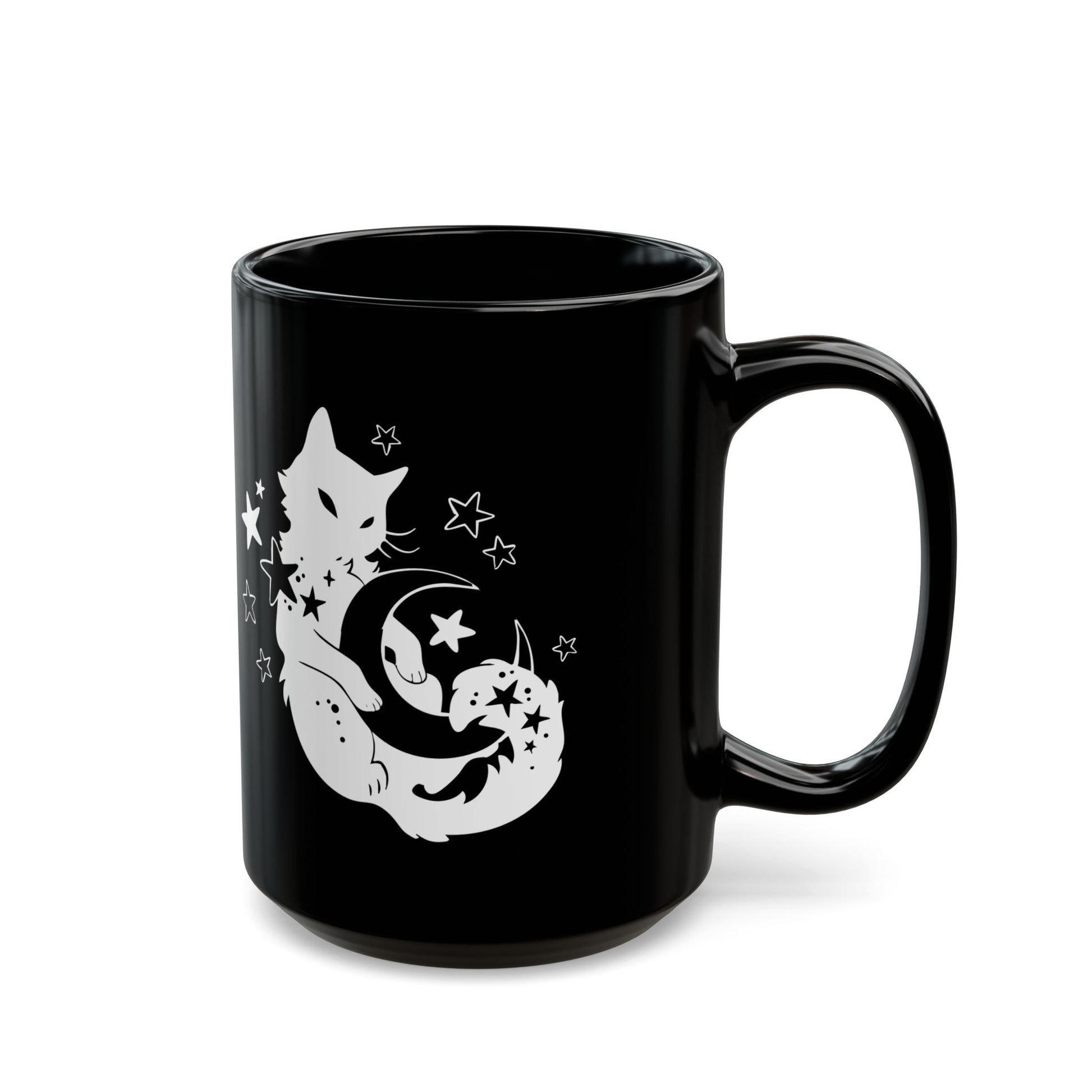 Black mug with a white cat and moon design on a white background