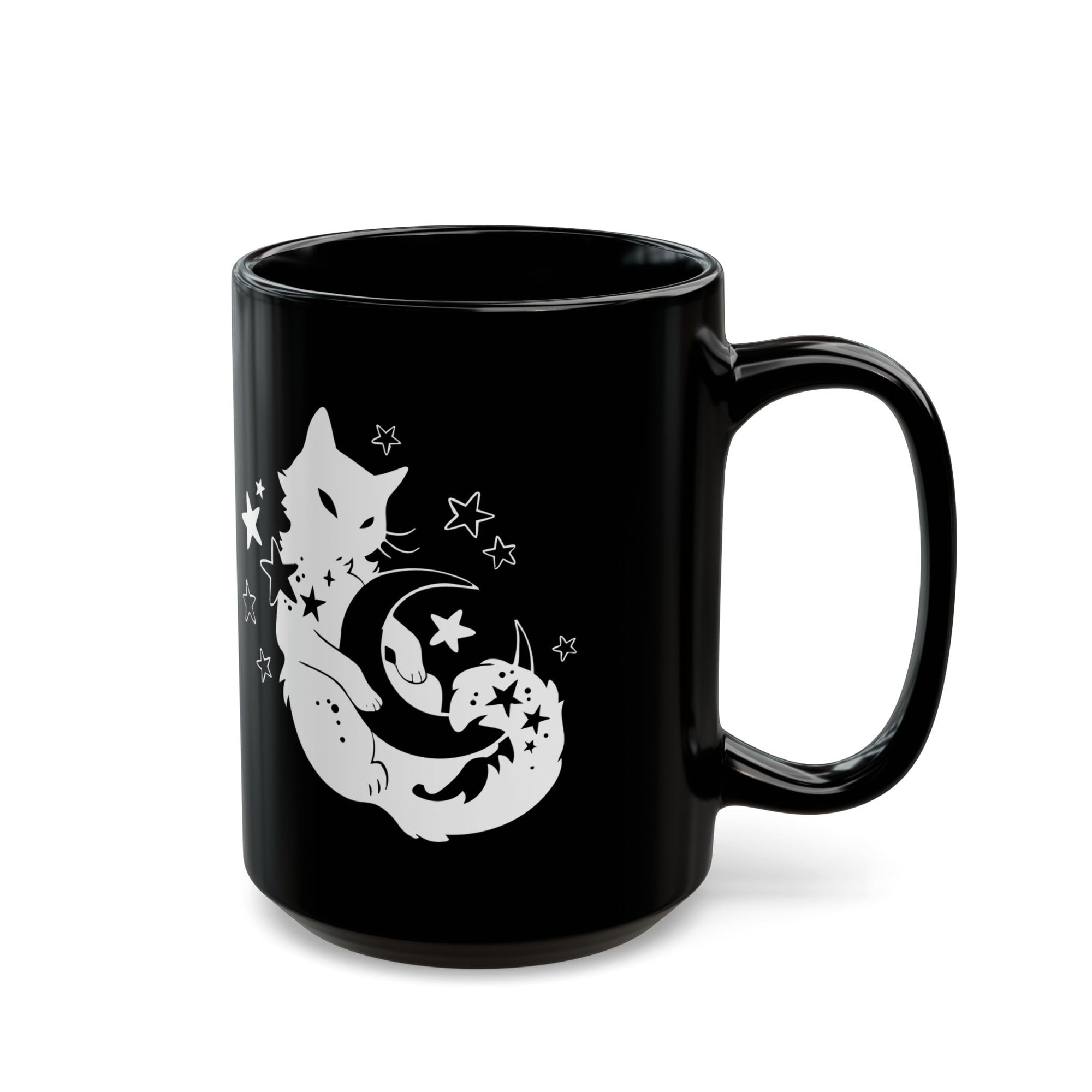 Black mug with a white cat and moon design on a white background