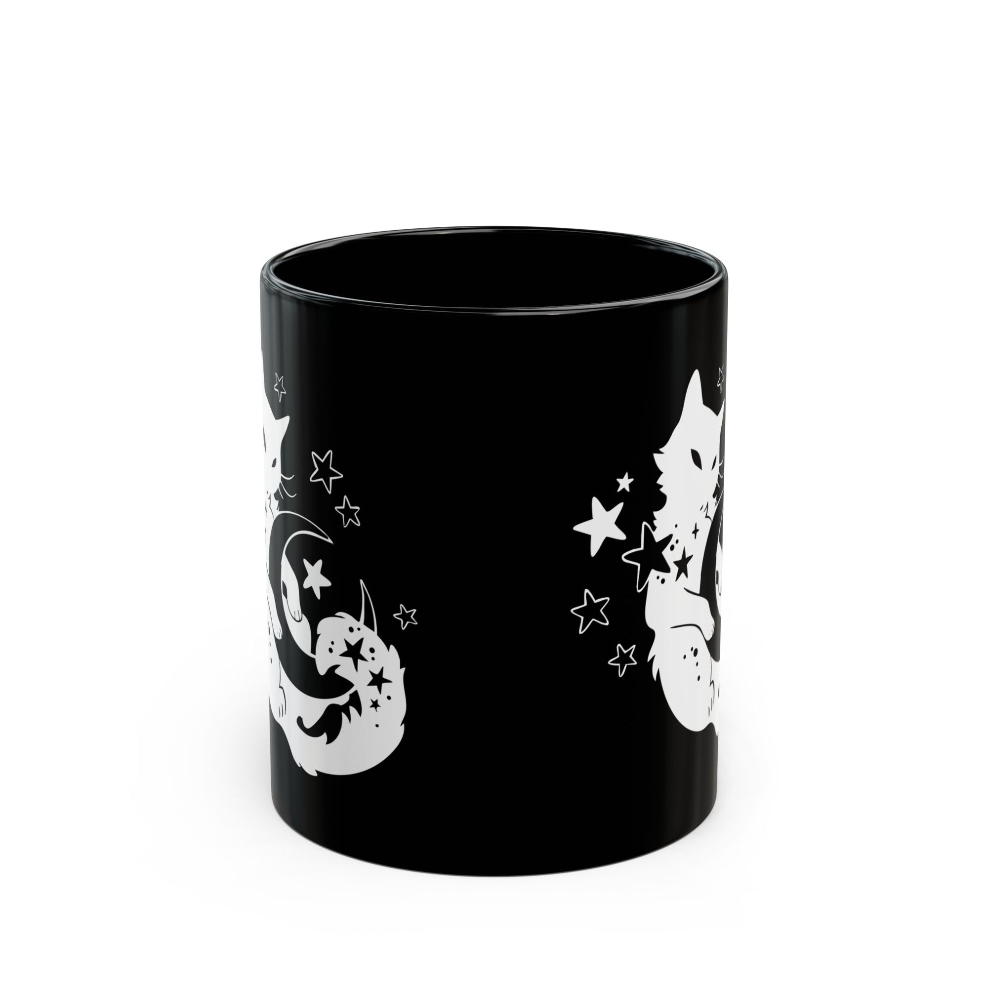 Black mug with white cat and star designs on a white background