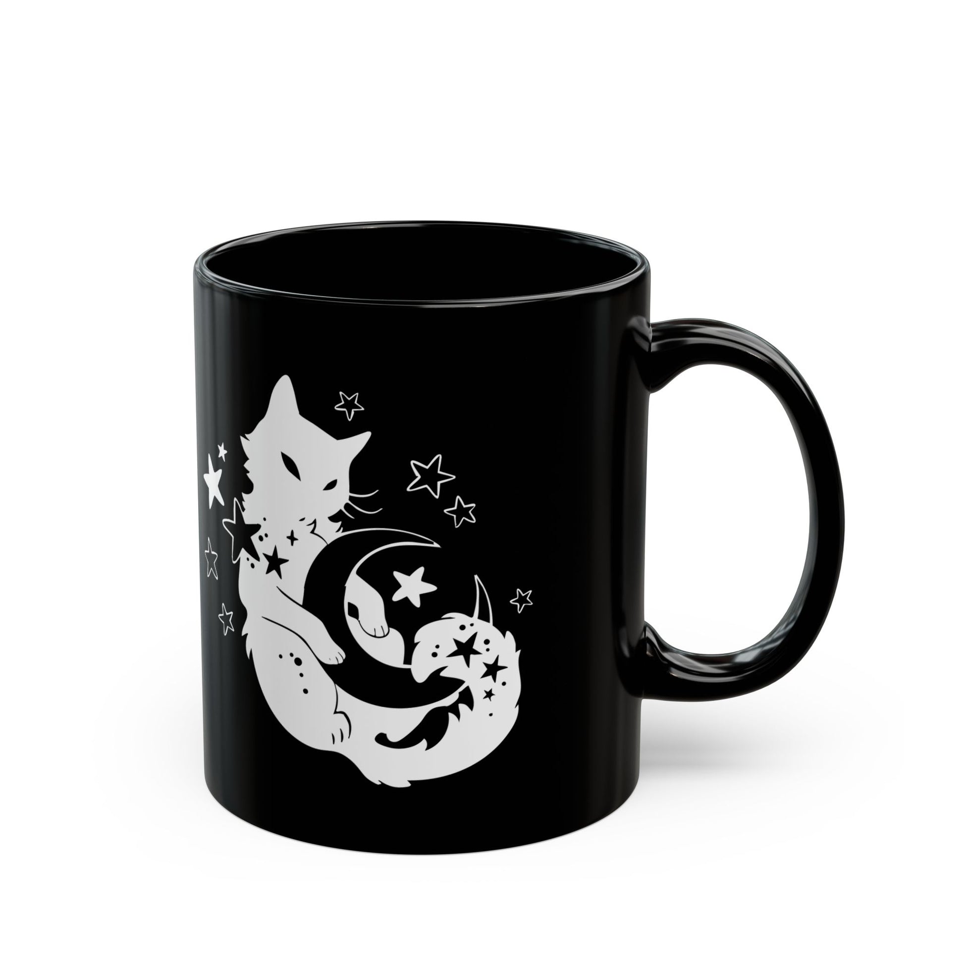 Black mug with white cat and moon design on a white background