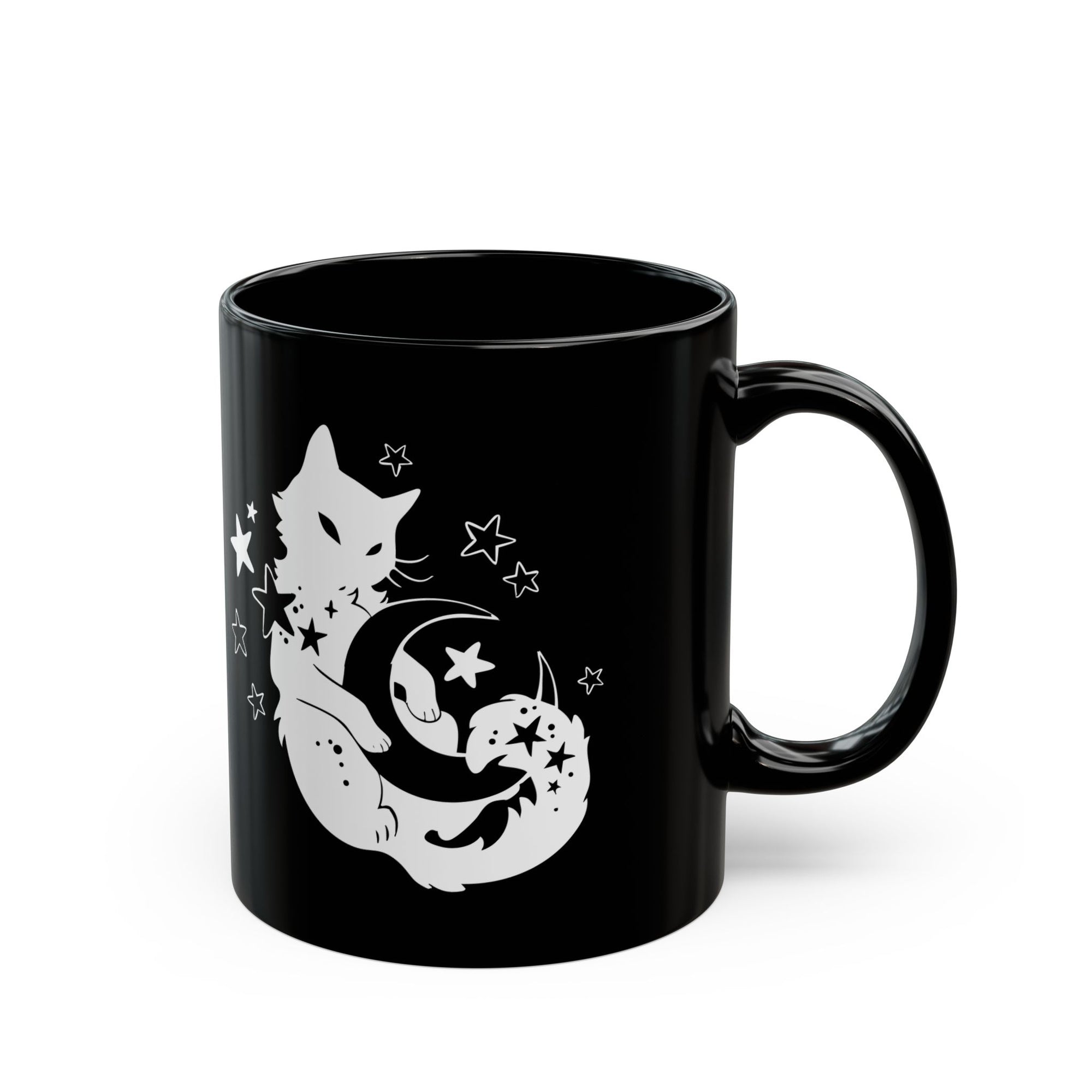 Black mug with white cat and moon design on a white background