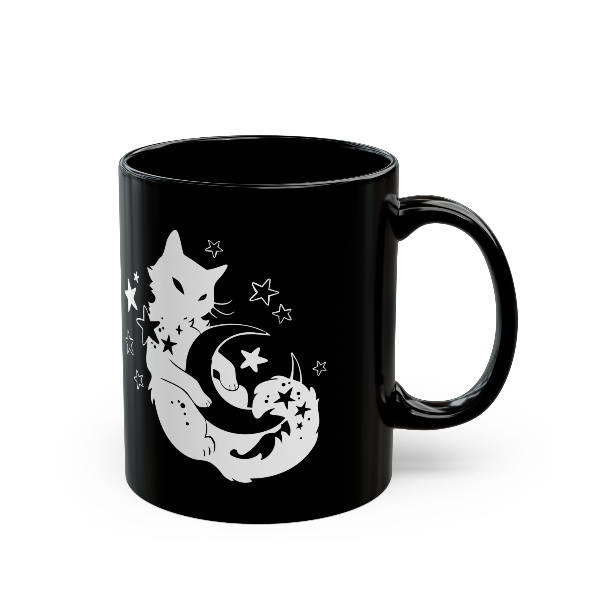 Black mug with white cat and moon design on a white background