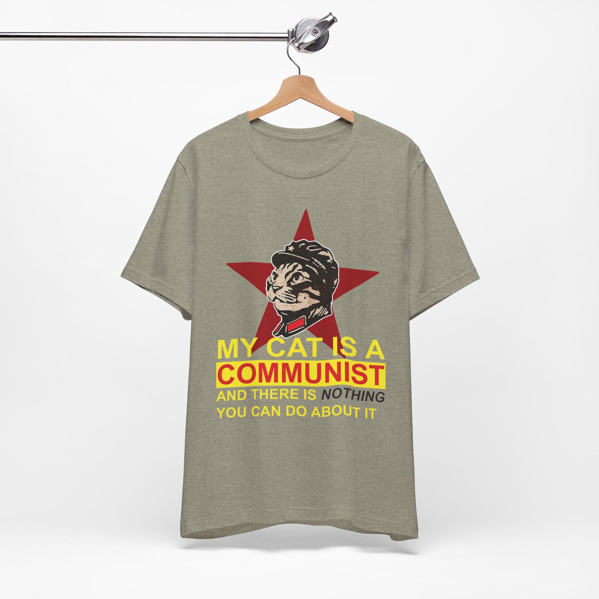 Gray t-shirt with a graphic of a cat in a military uniform and text on a hanger against a white background
