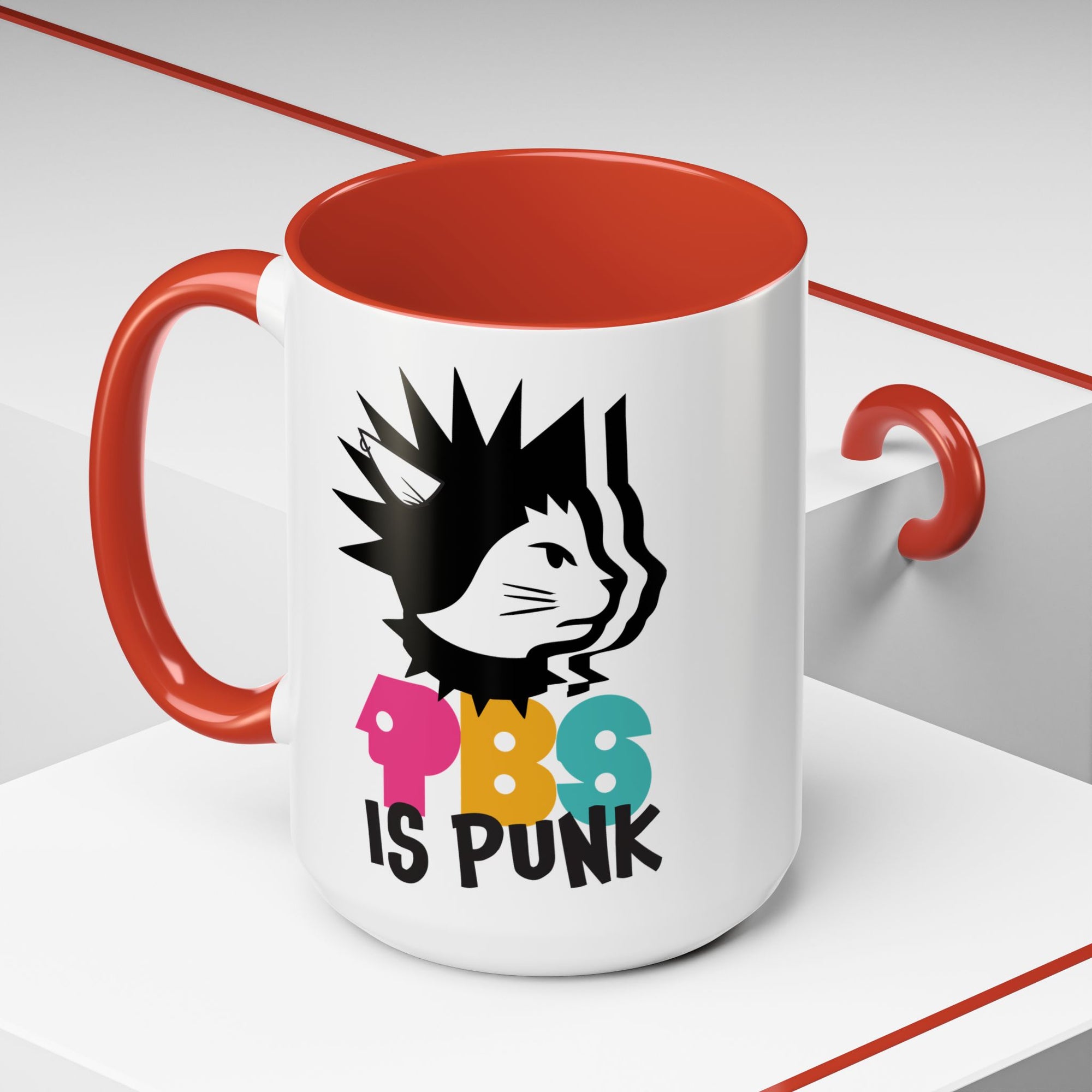 Mug with a graphic design of a cat and text 'PBS IS PUNK' on a white background