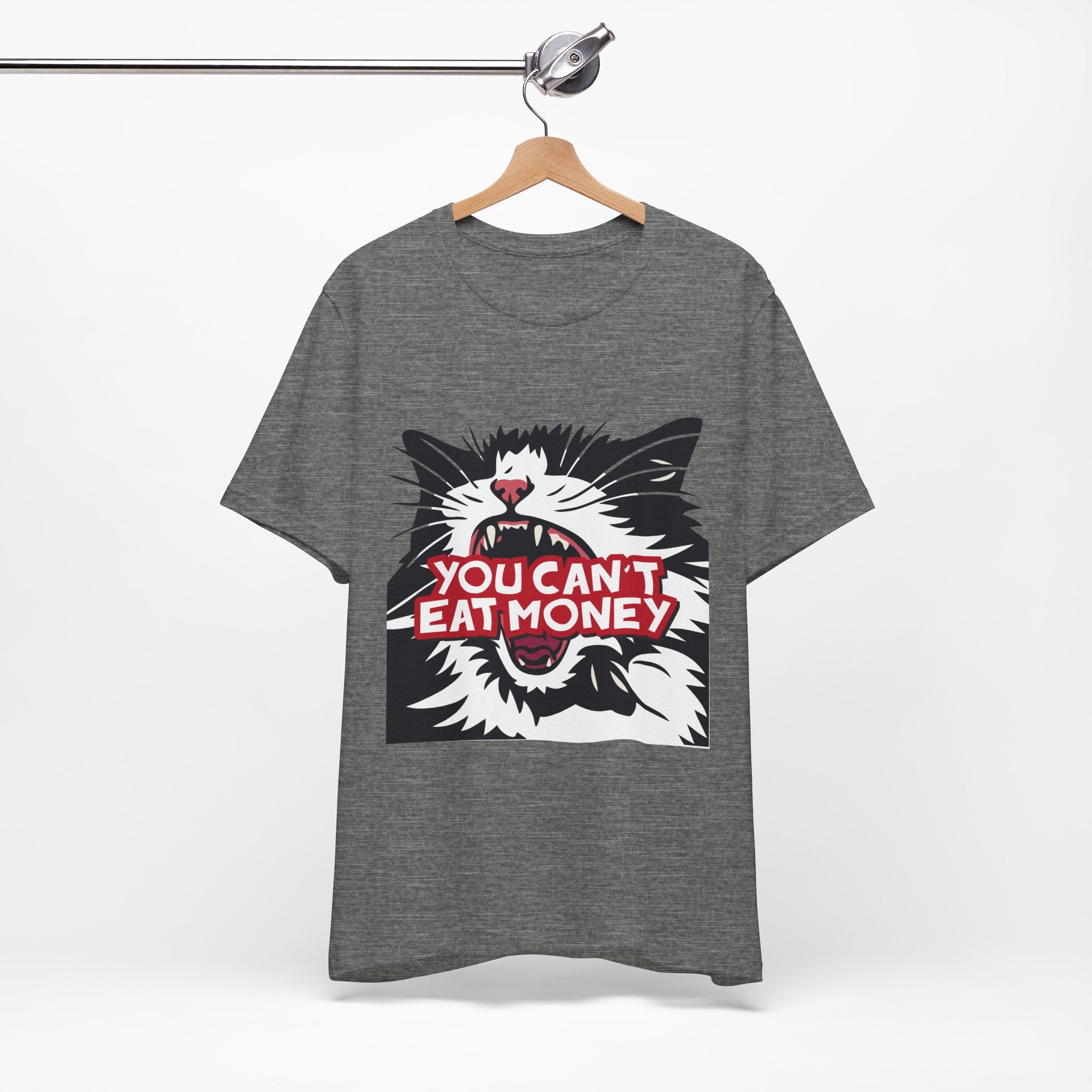 grey t-shirt featuring a bold black, white, and red angry cat graphic with the phrase “You Can’t Eat Money.”
