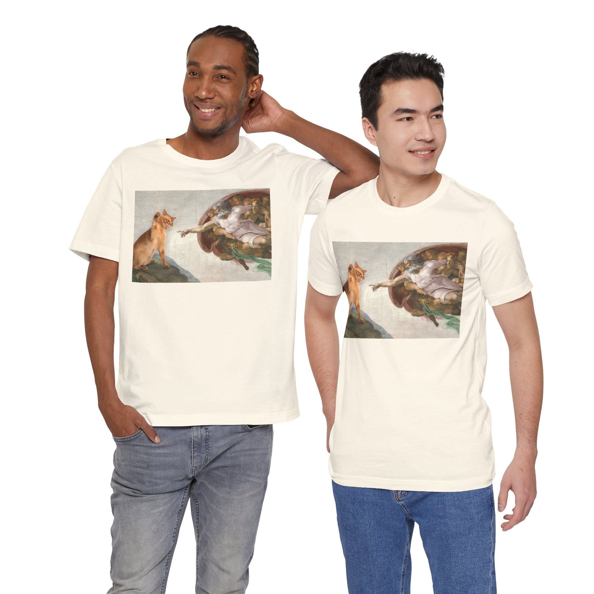 Two men wearing cream t-shirts with a graphic design of acat and god on a white background.
