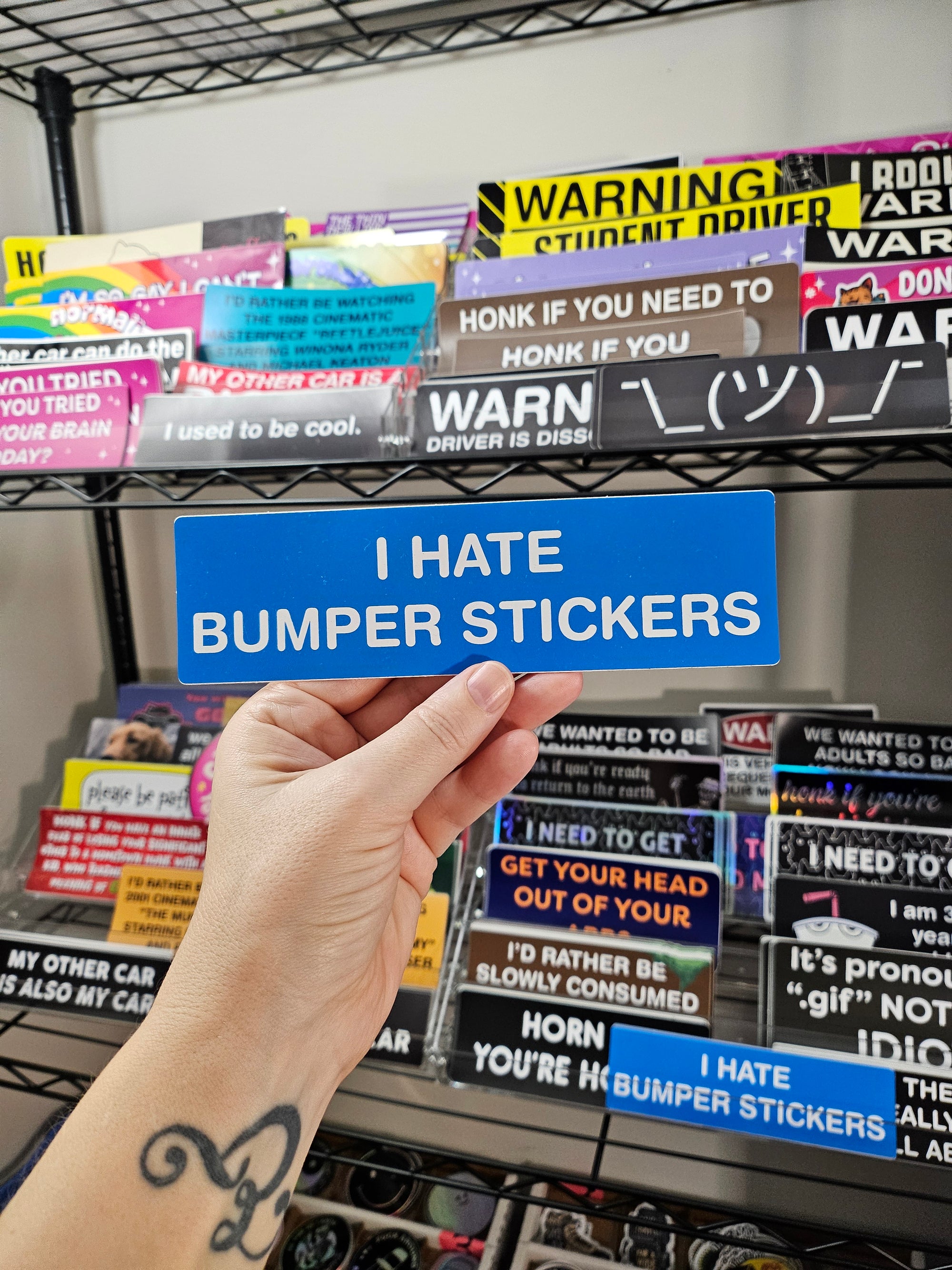 rectangular “I Hate Bumper Stickers” bumper stickers shown in blue color  with white text.

