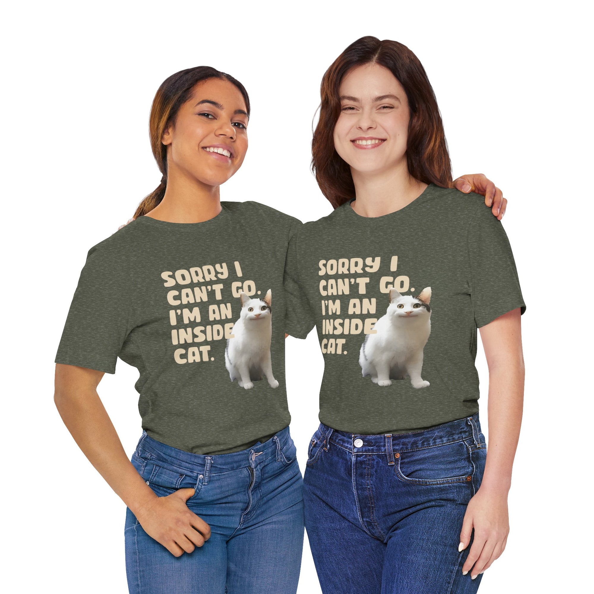 Two people wearing matching green t-shirts with a graphic of a dog and text.