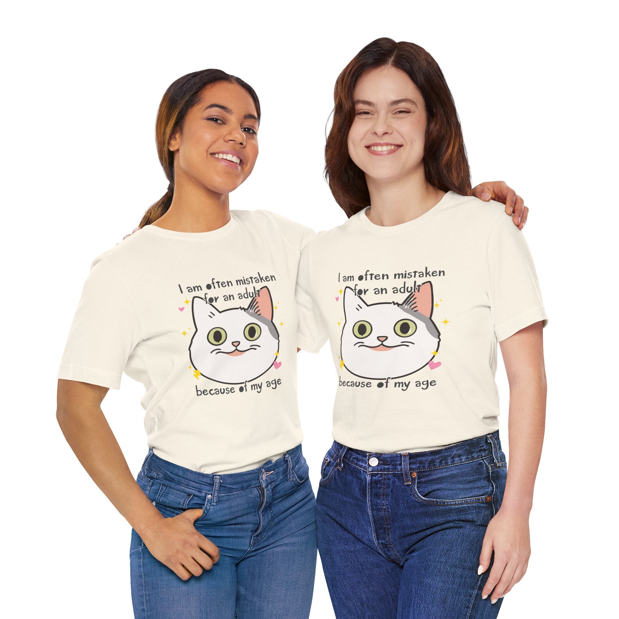 Two women wearing white t-shirts with colorful designs on a white background