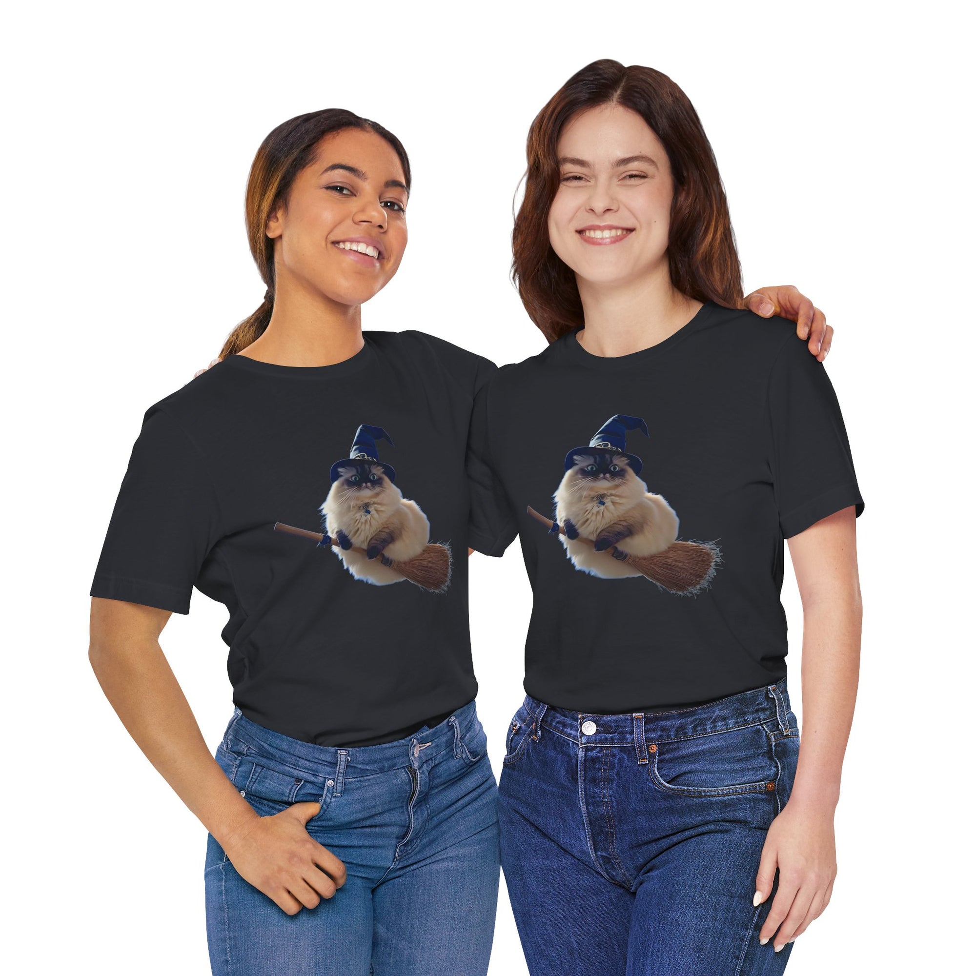 Two women wearing Black t-shirt featuring a fluffy cat wearing a blue witch hat and riding a broomstick.

