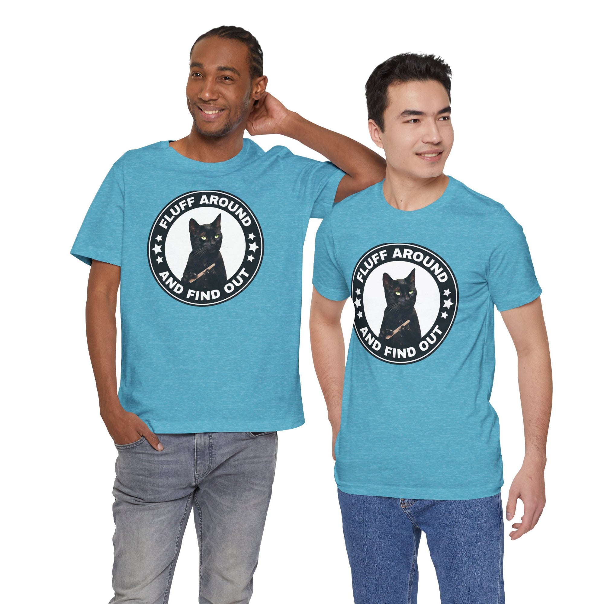 Two men wearing blue t-shirt featuring a circular badge design with a black cat and the phrase “Fluff Around and Find Out.”