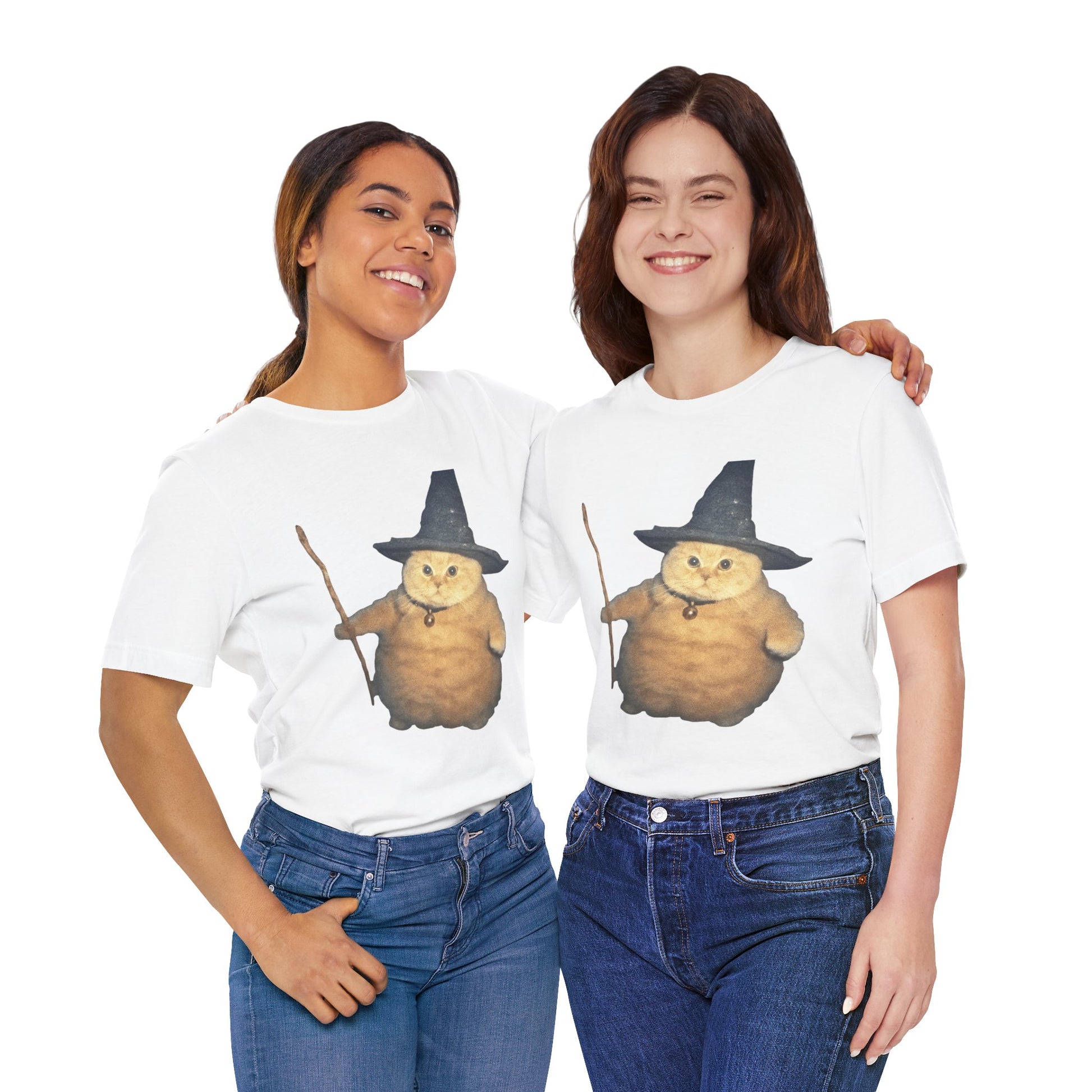 Two people wearing white t-shirts with a cartoon cat in a witch hat design on a white background.