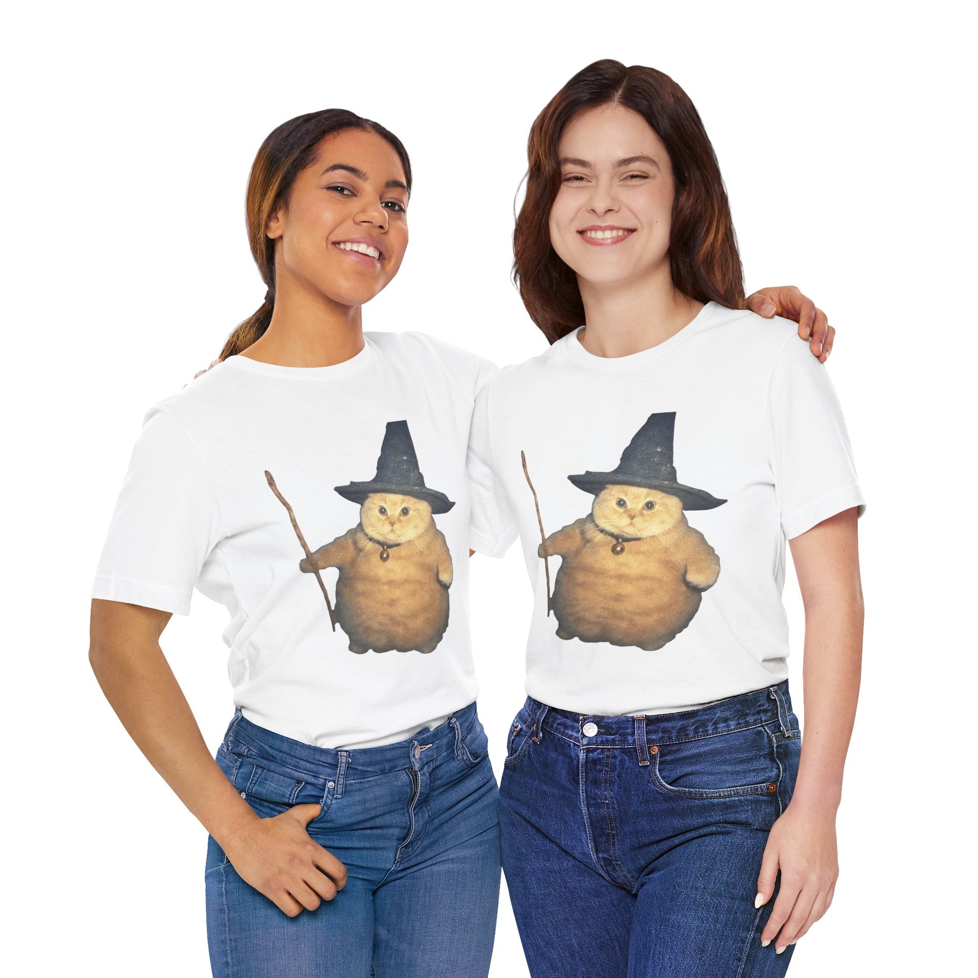 Two people wearing white t-shirts with a cartoon cat in a witch hat design on a white background.