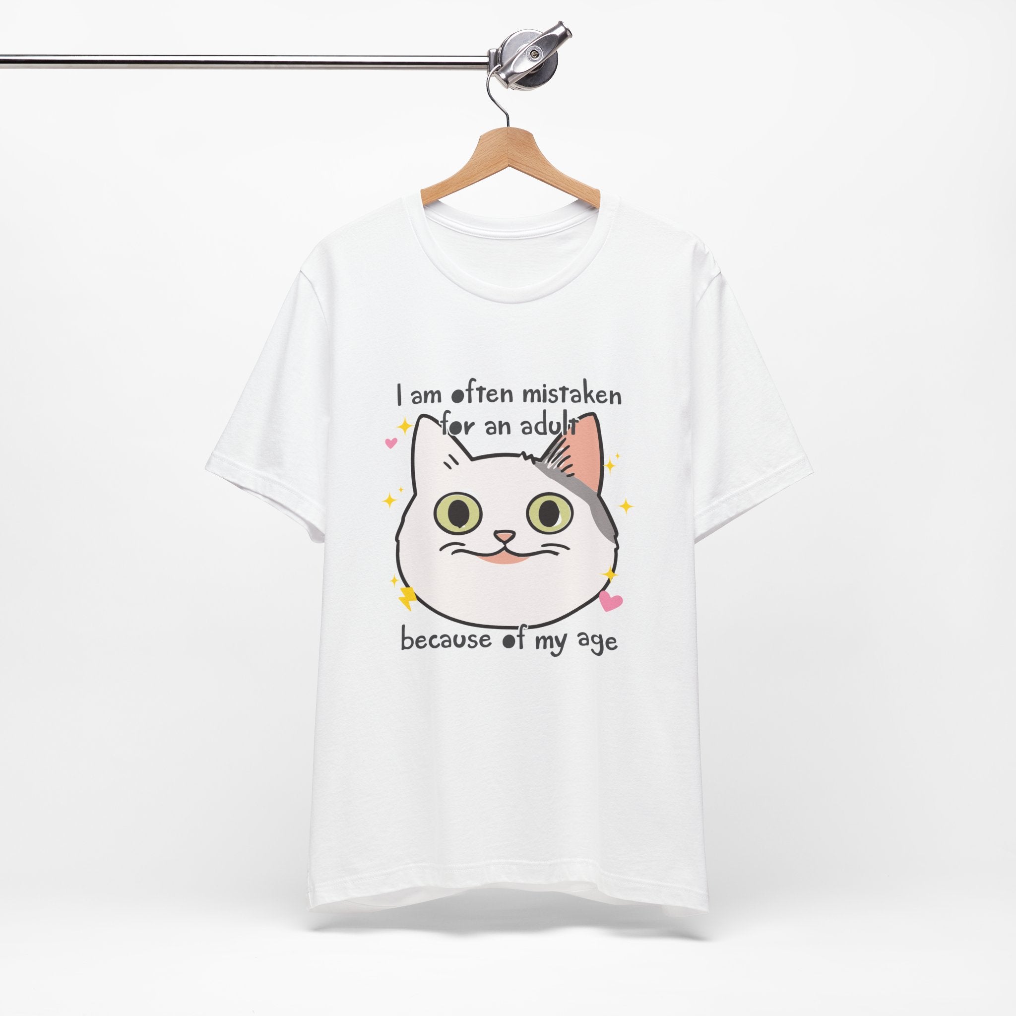 White t-shirt with a cat graphic and text on a white background