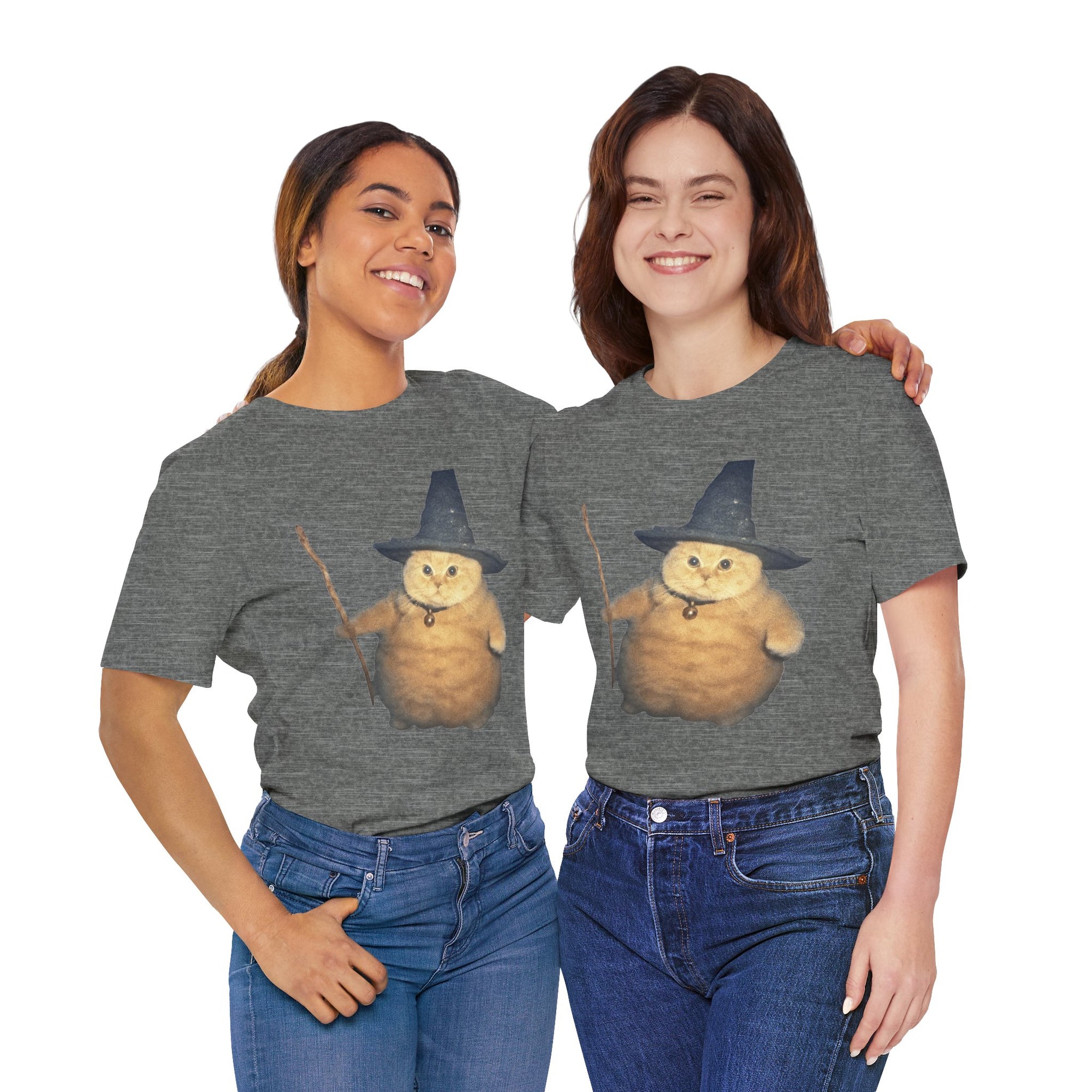 Two people wearing gray t-shirts with a cat in a witch hat design on a white background.