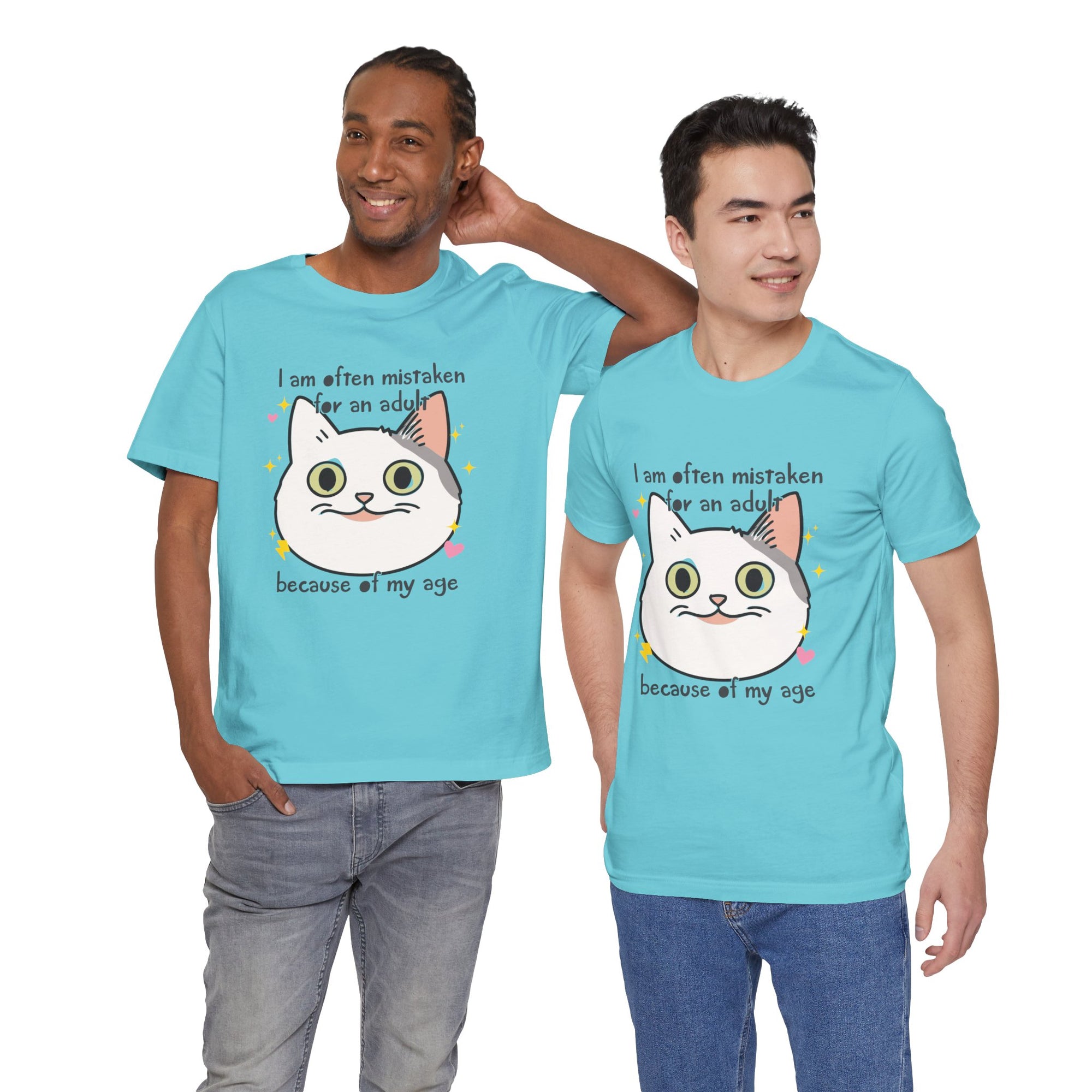 Two men wearing matching light blue t-shirts with a cartoon cat graphic and text.