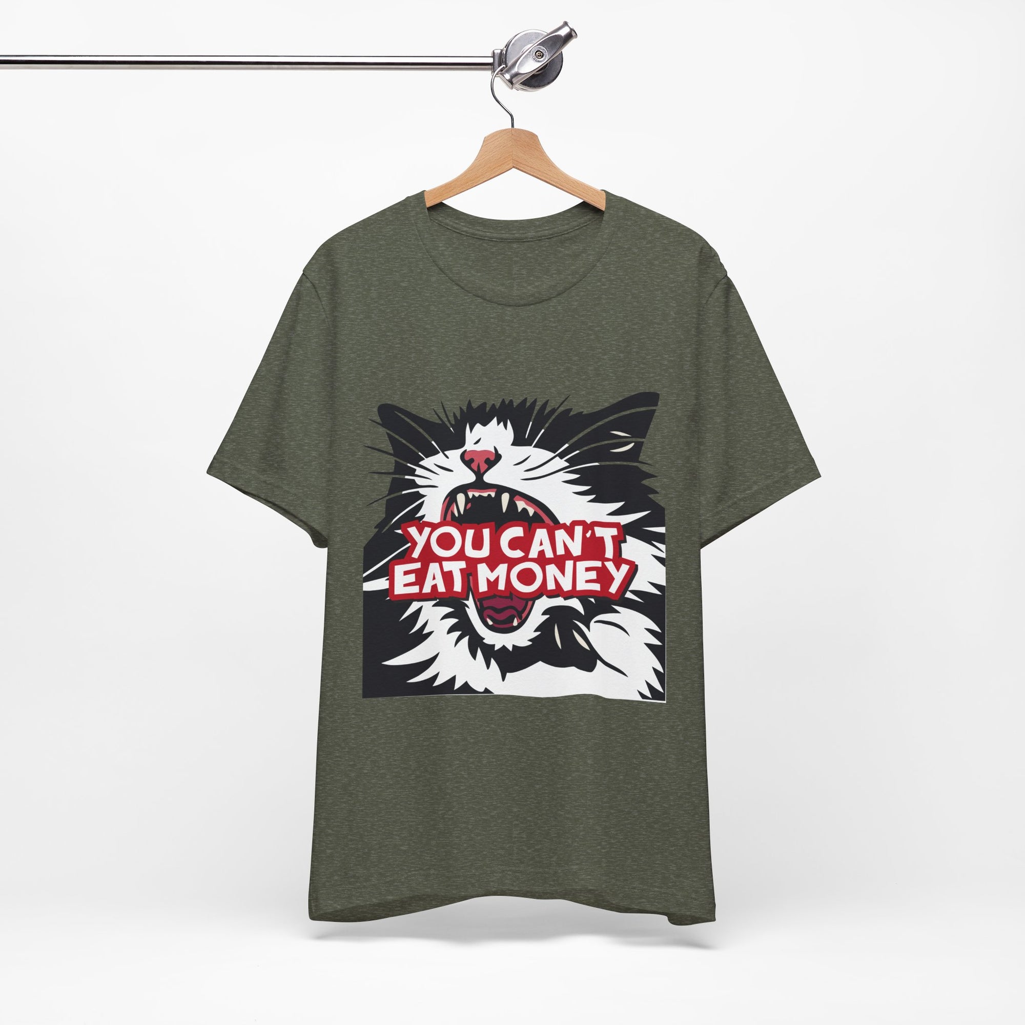 t-shirt featuring a bold black, white, and red angry cat graphic with the phrase “You Can’t Eat Money.”
