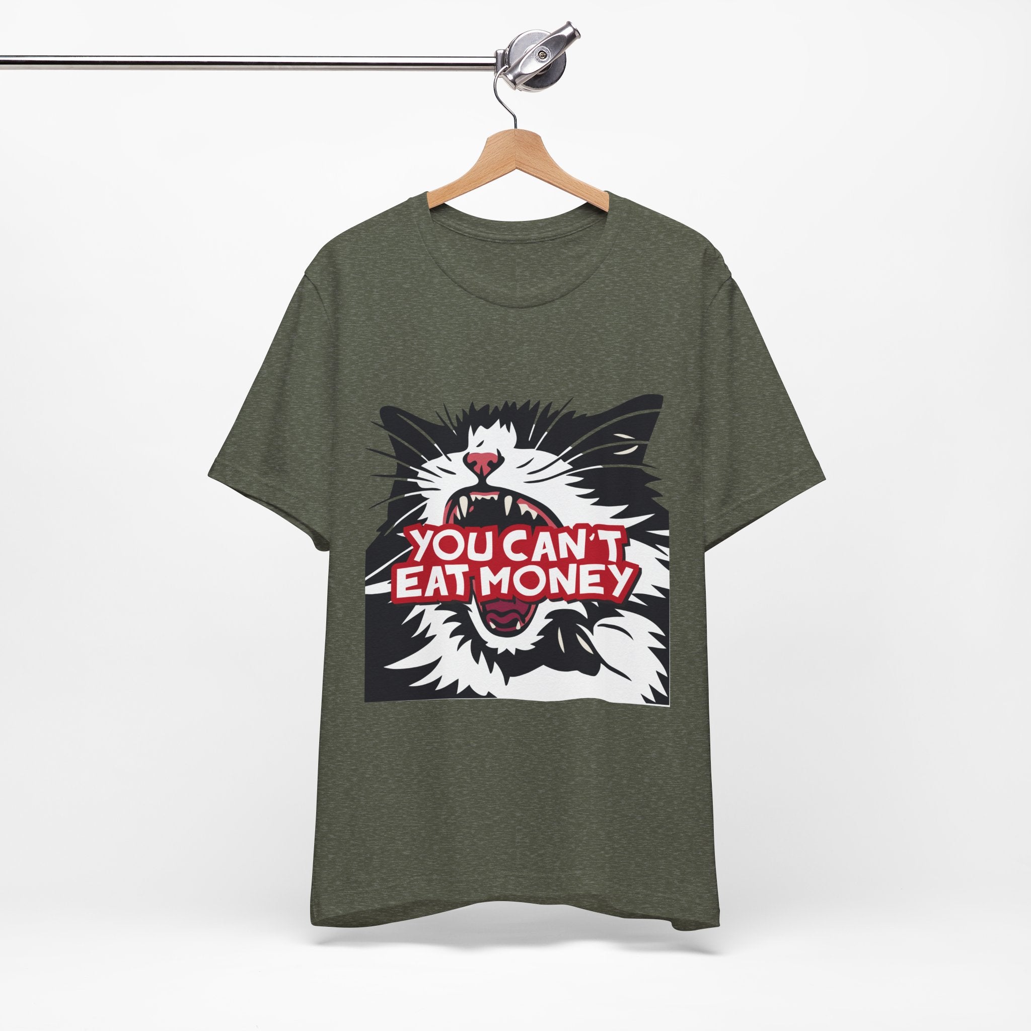 t-shirt featuring a bold black, white, and red angry cat graphic with the phrase “You Can’t Eat Money.”
