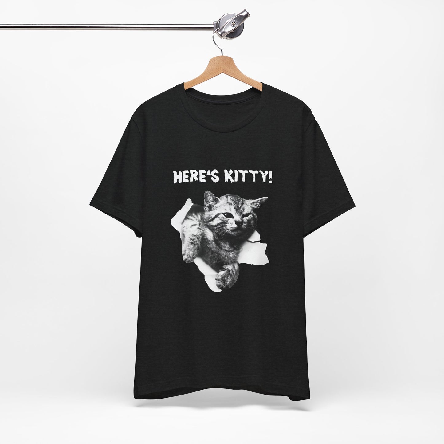 Black t-shirt with a cat graphic and 'HERE'S KITTY!' text on a hanger against a white background