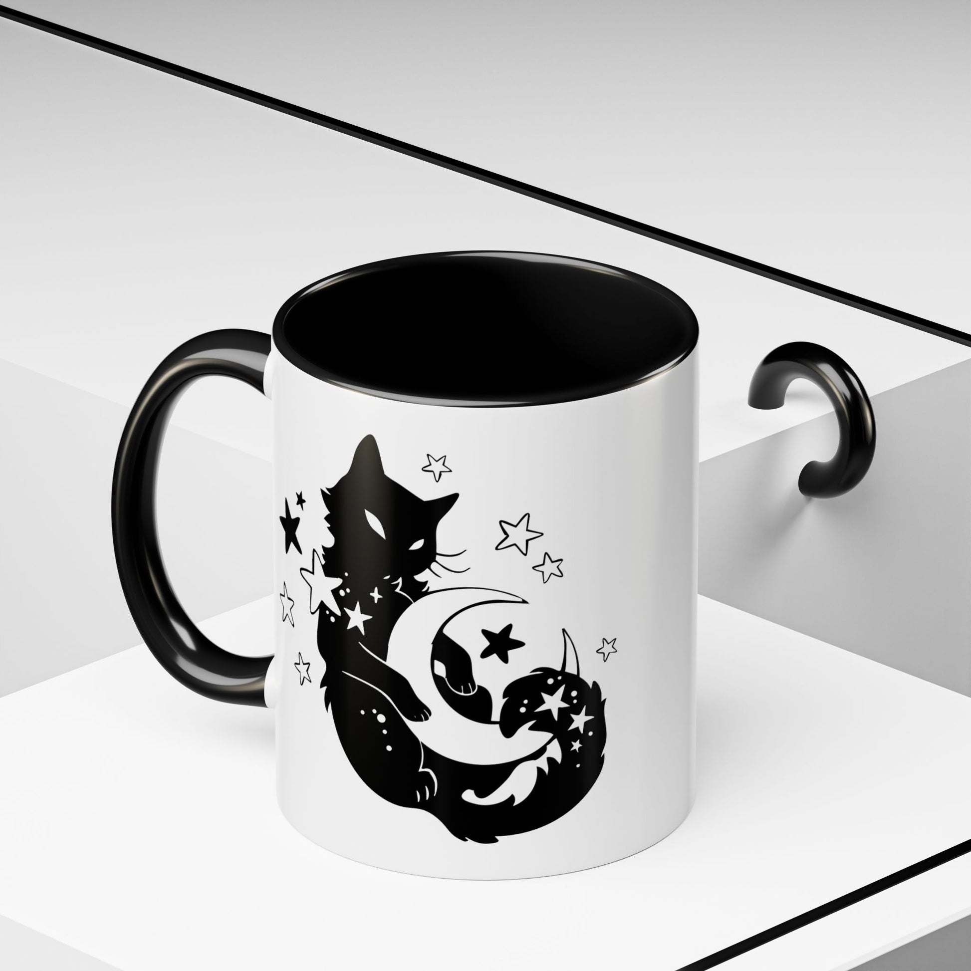 White mug with black interior and handle, featuring a black cat and moon design.