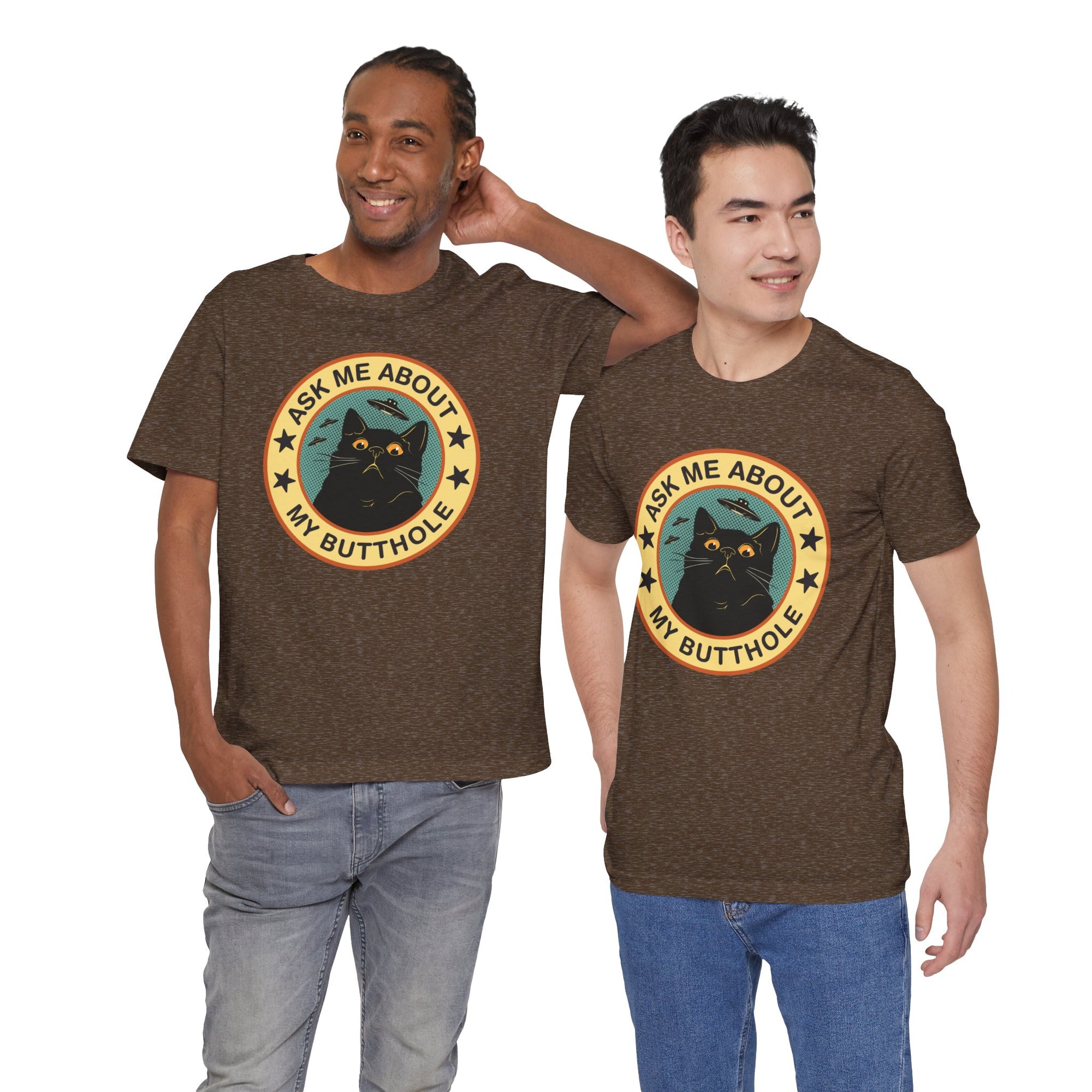 Two men wearing brown t-shirts with a black cat graphic and text.