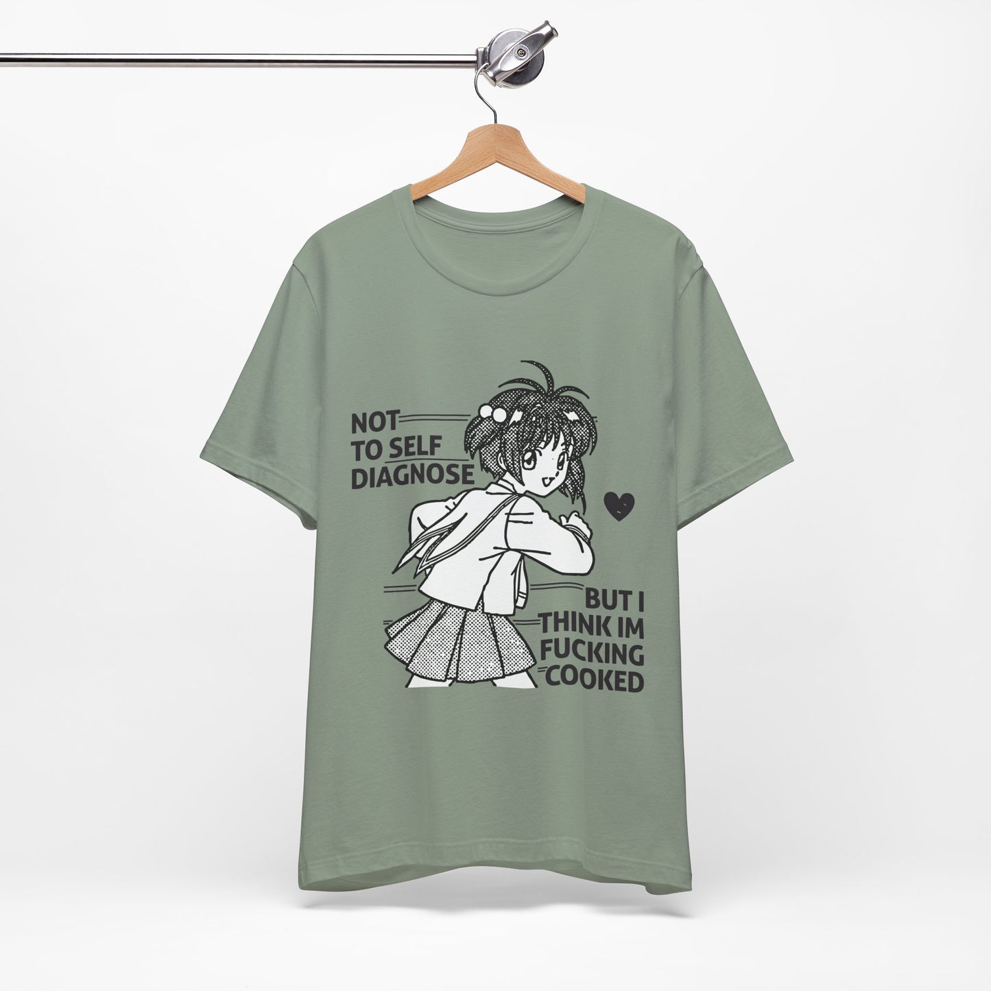 Green t-shirt with graphic design and text on a hanger against a white background