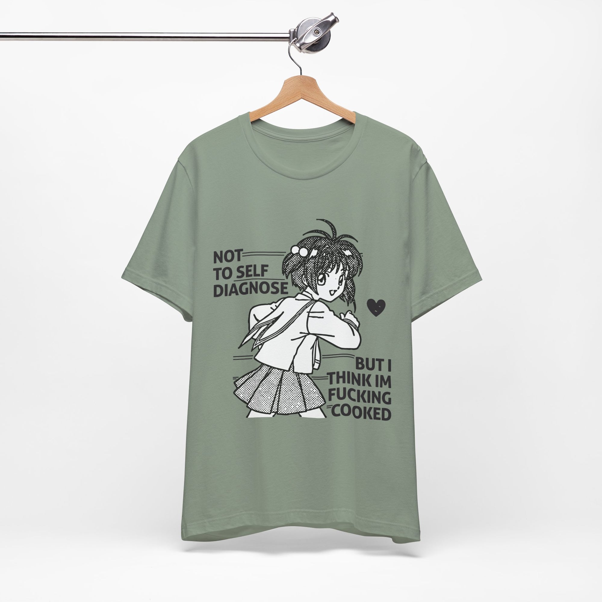 Green t-shirt with graphic design and text on a hanger against a white background